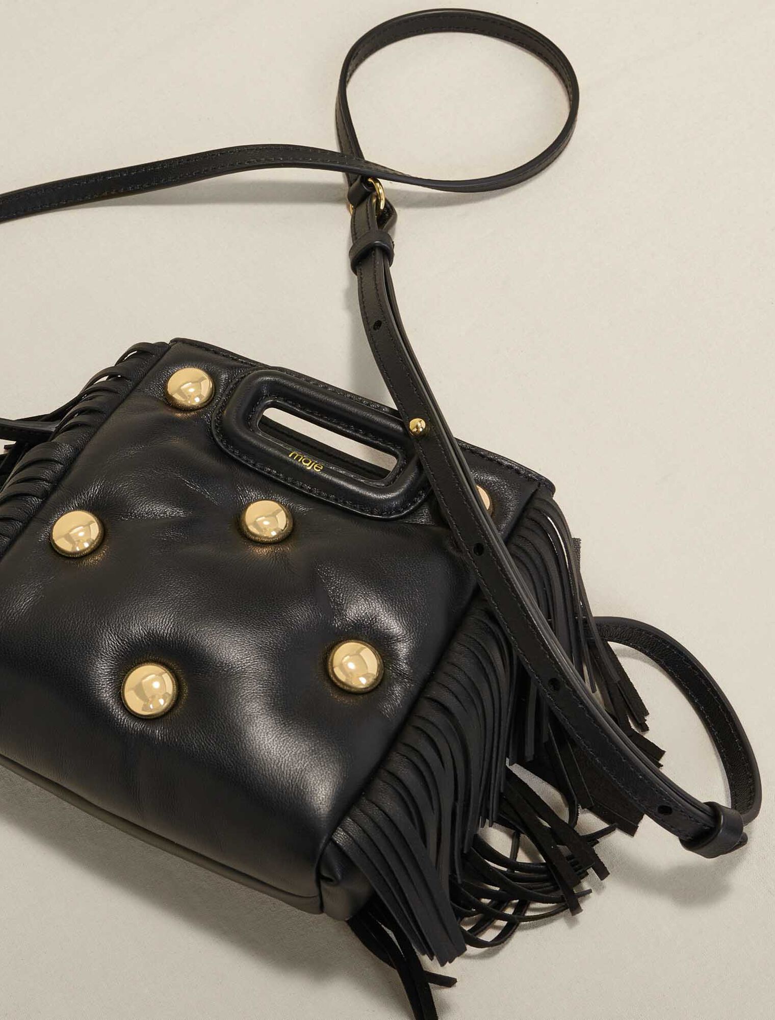 Sac M en cuir matelassé à studs