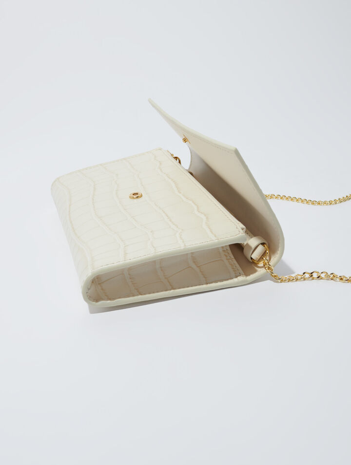 Croc-effect embossed leather bag
