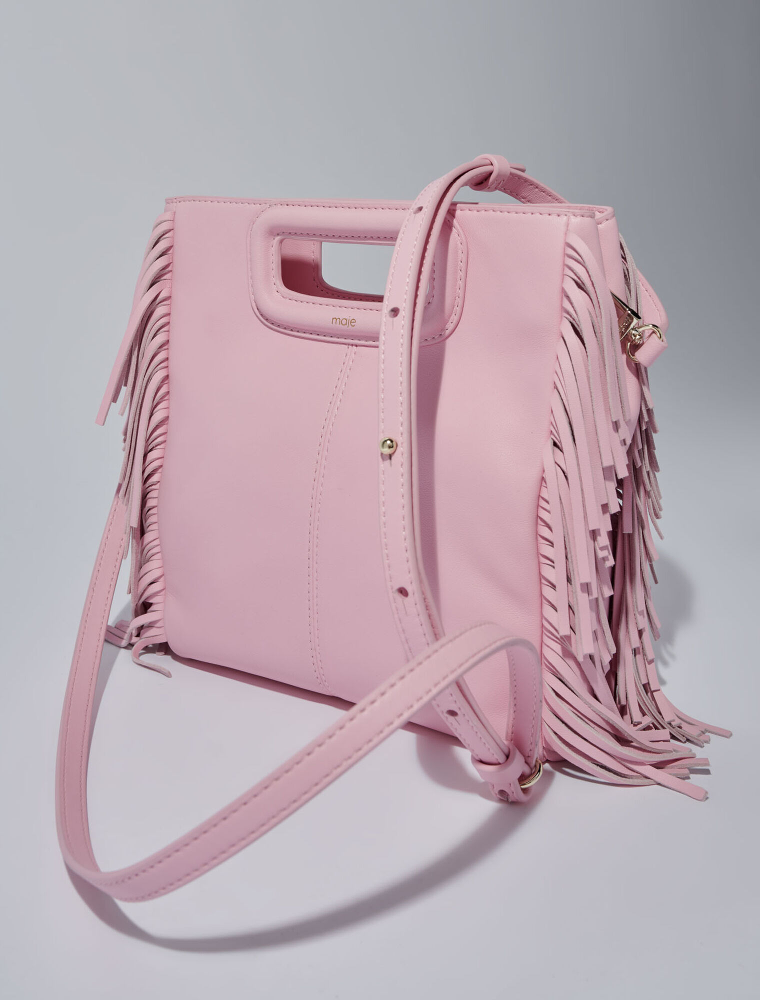 Smooth leather M bag with fringing