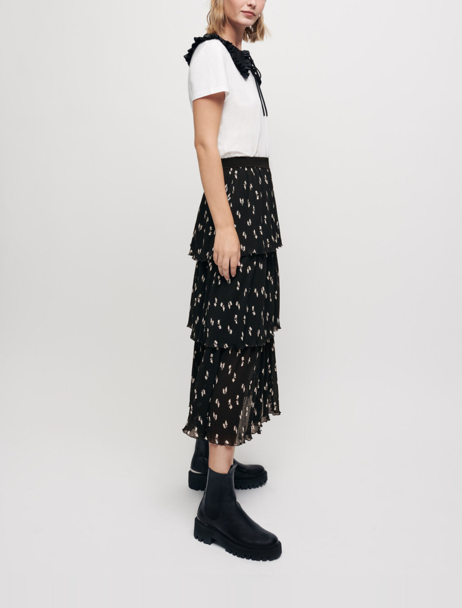 Mini pleated skirt with bow print