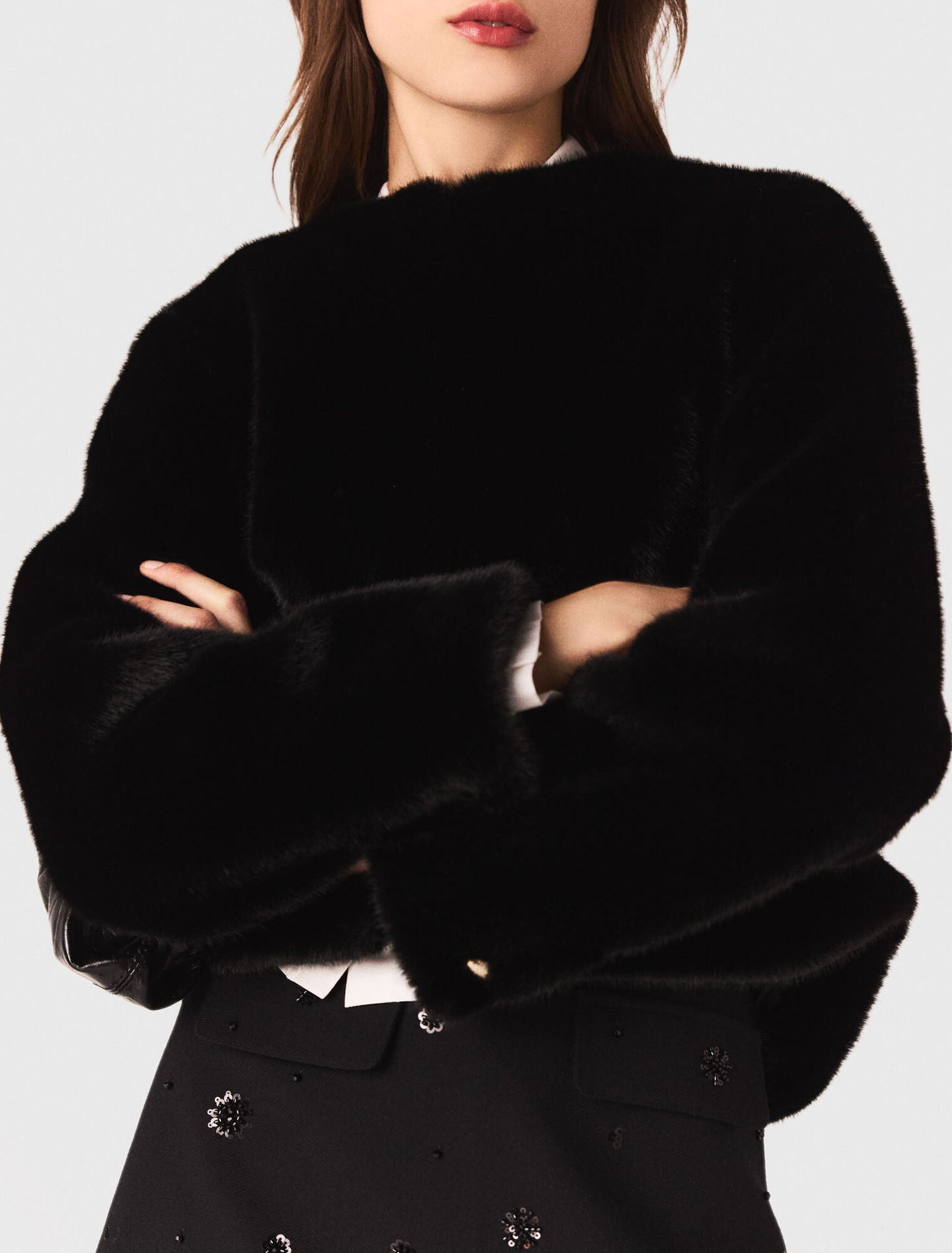 Manteau court en fausse fourrure