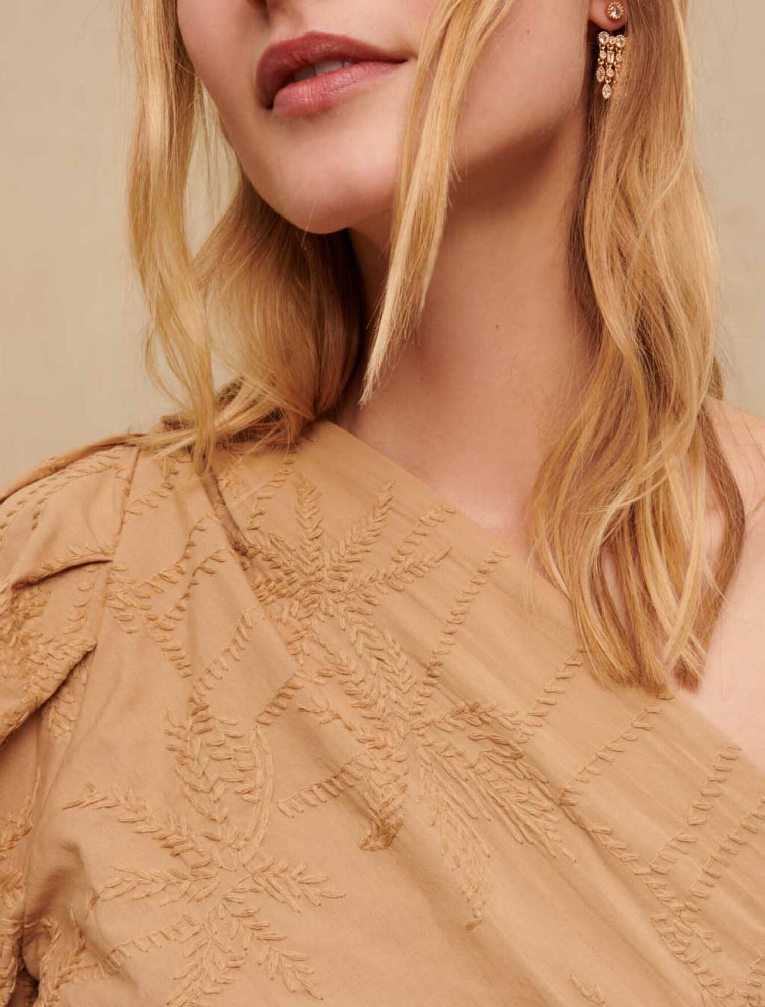 Asymmetric tie top