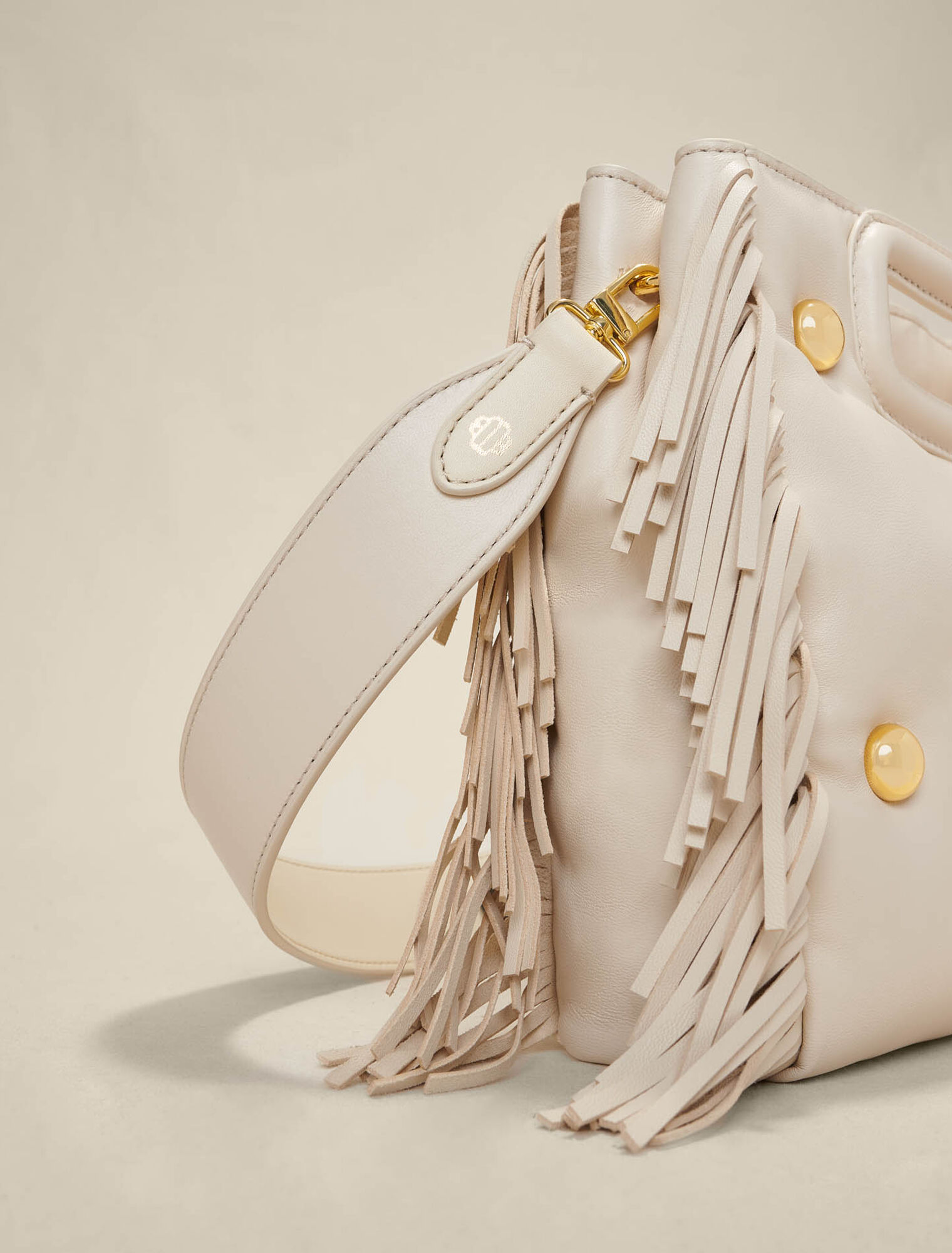 Leather M bag padded with studs