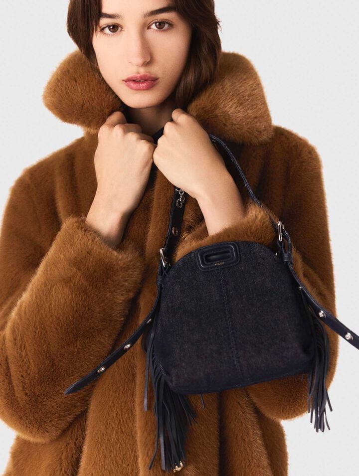 Manteau mi-long en fausse fourrure