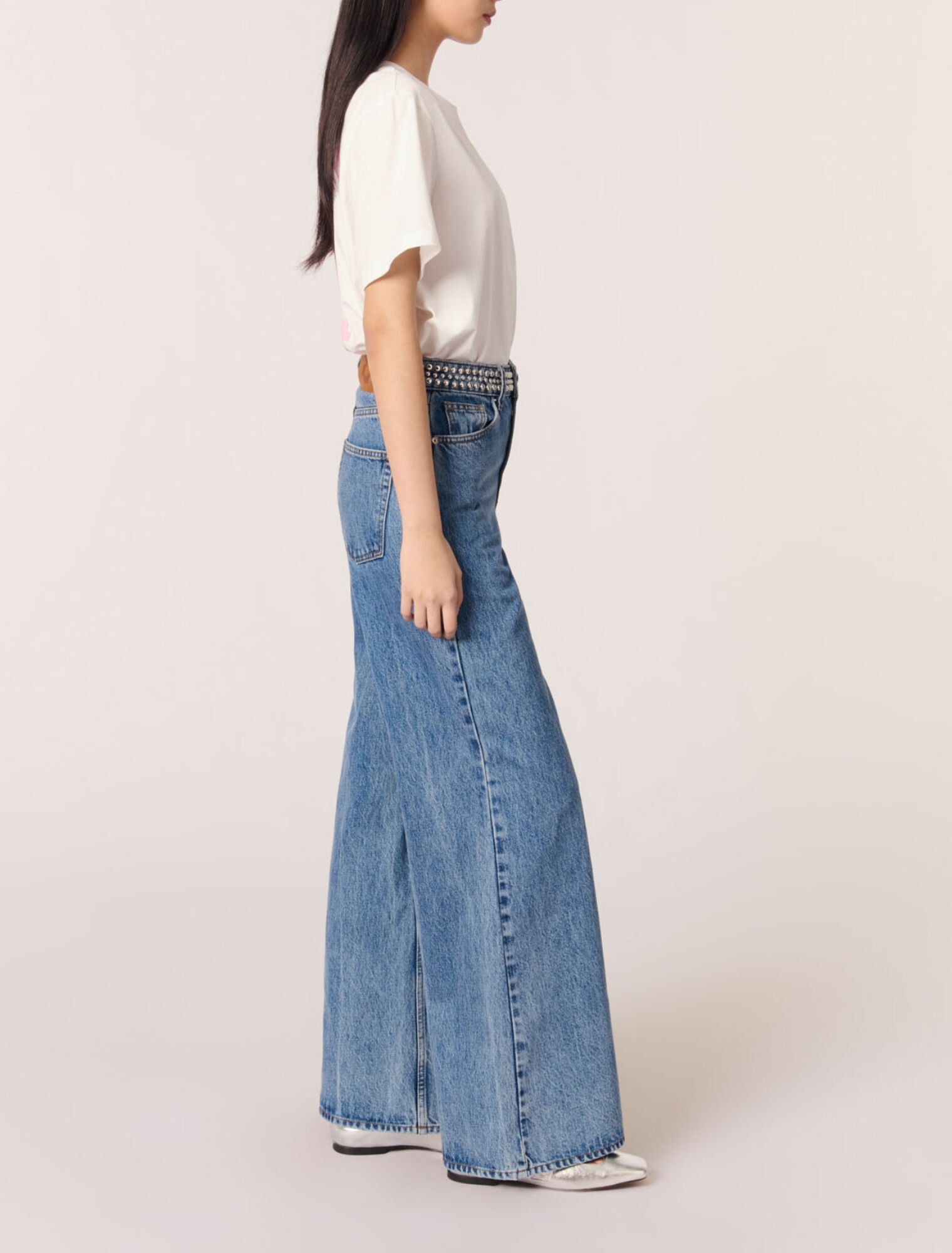 Jean flare &agrave; ceinture stud&eacute;e