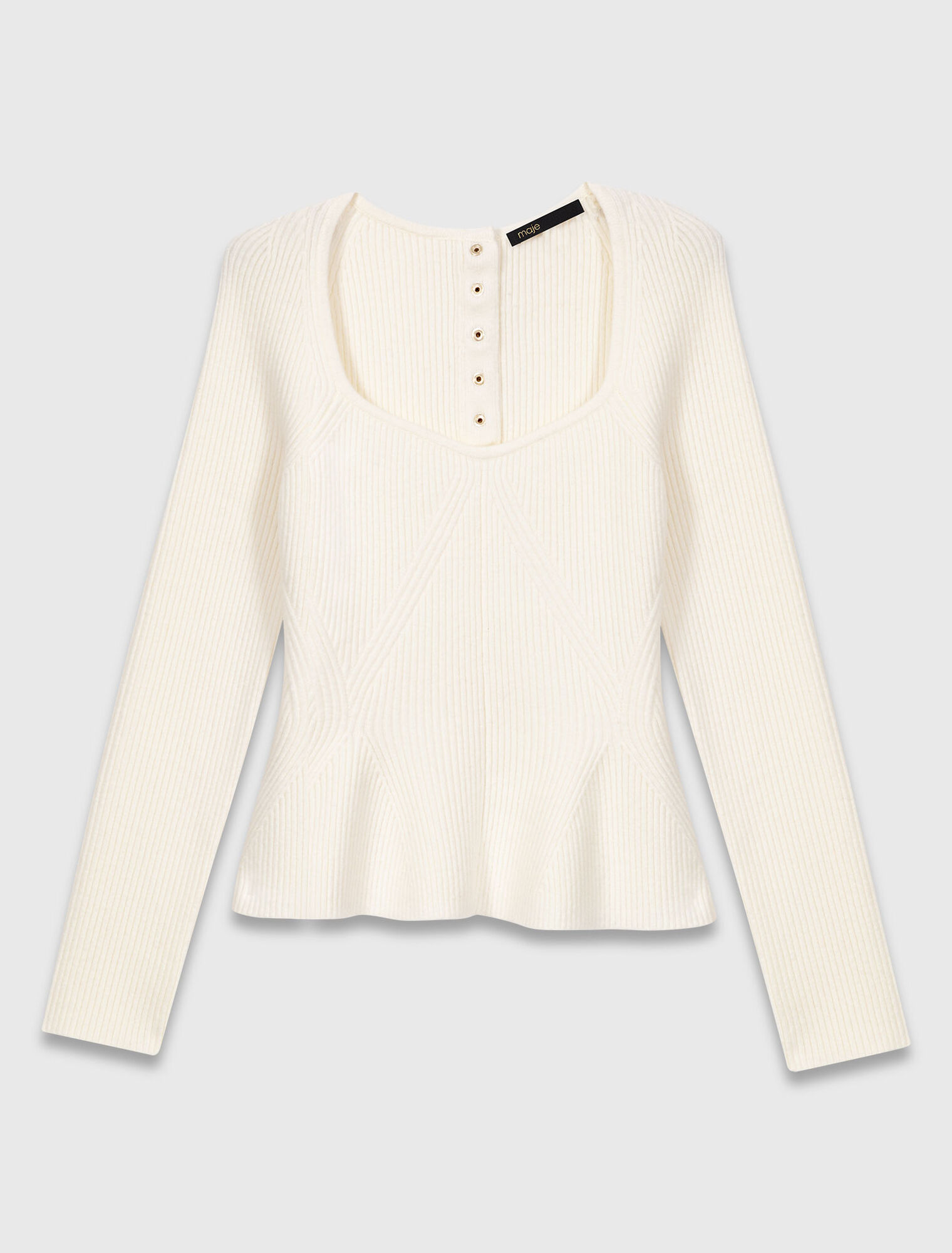 Pull en maille à taille péplum