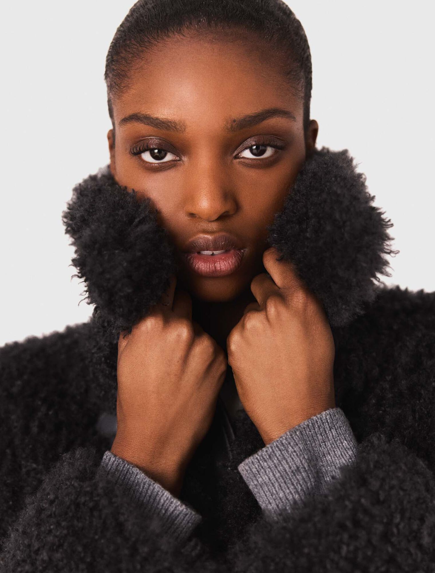 Manteau court en bouclette