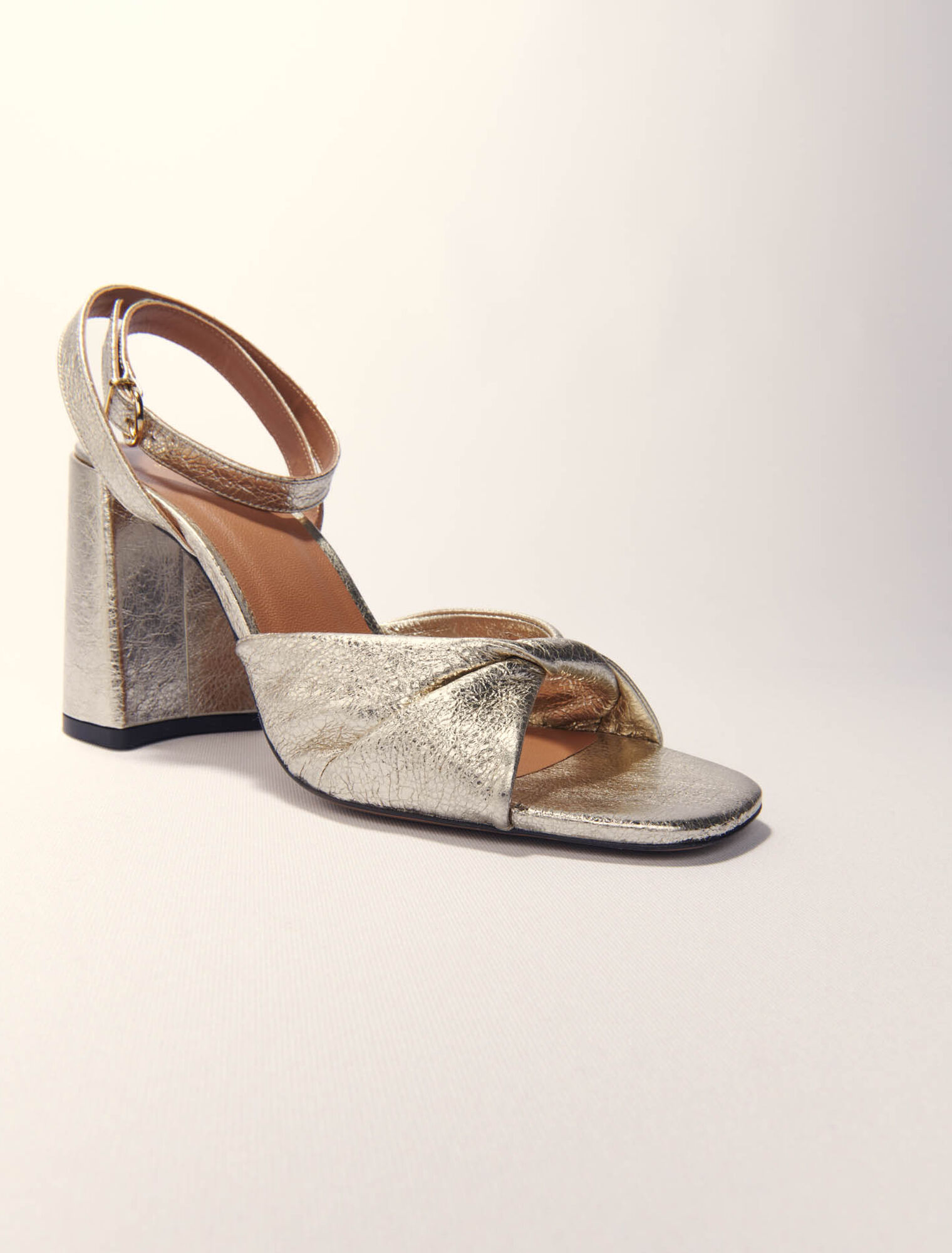 Metallic leather sandals with heels