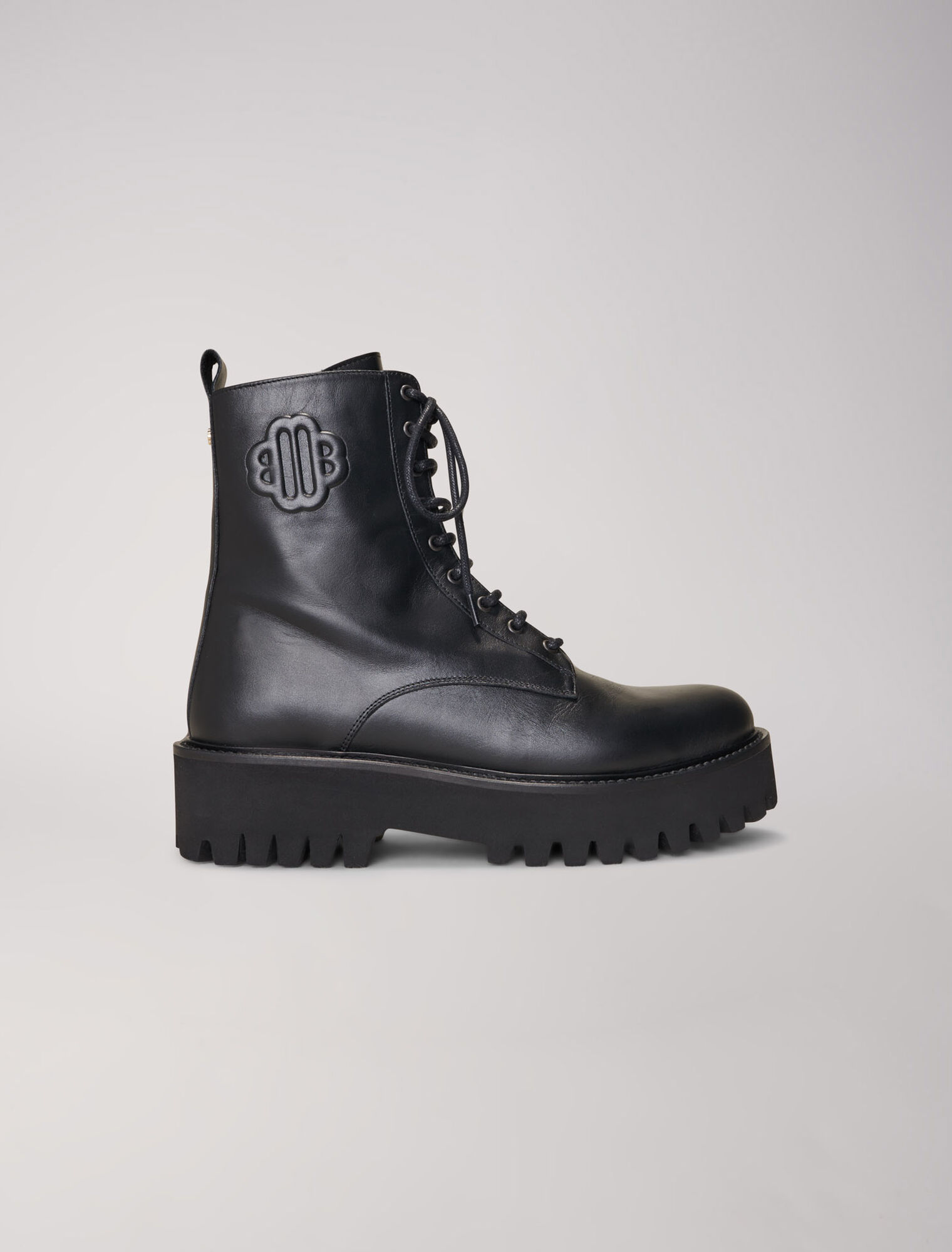 Black leather lace-up boots