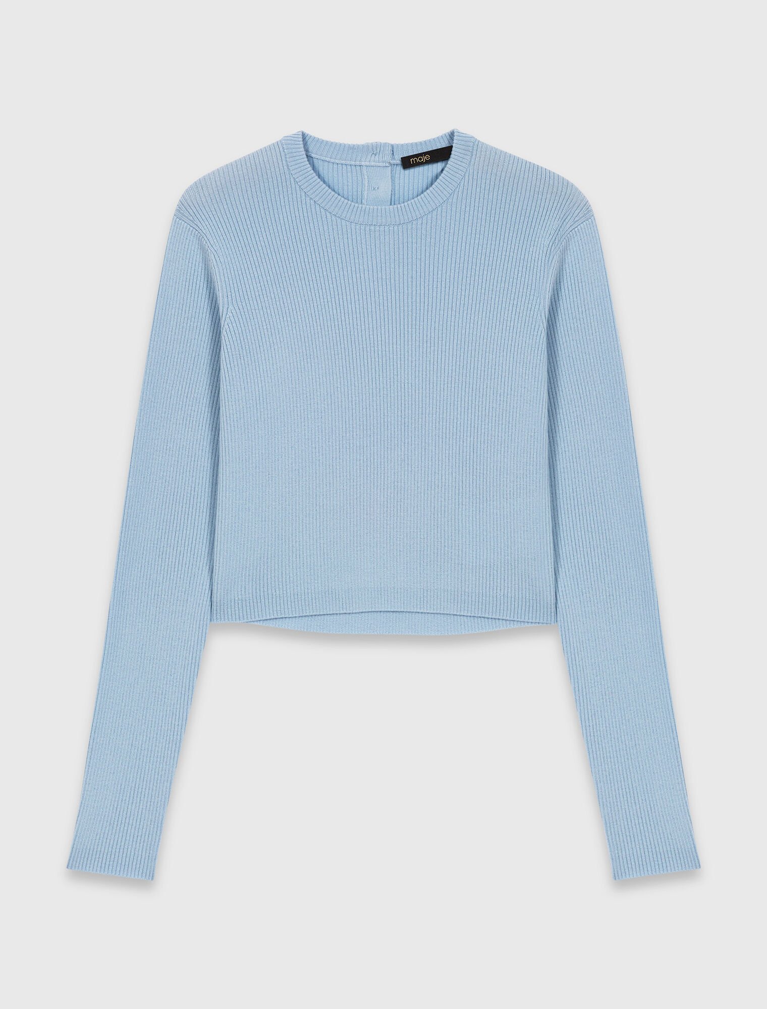 Pull avec boutons bijoux sur le dos