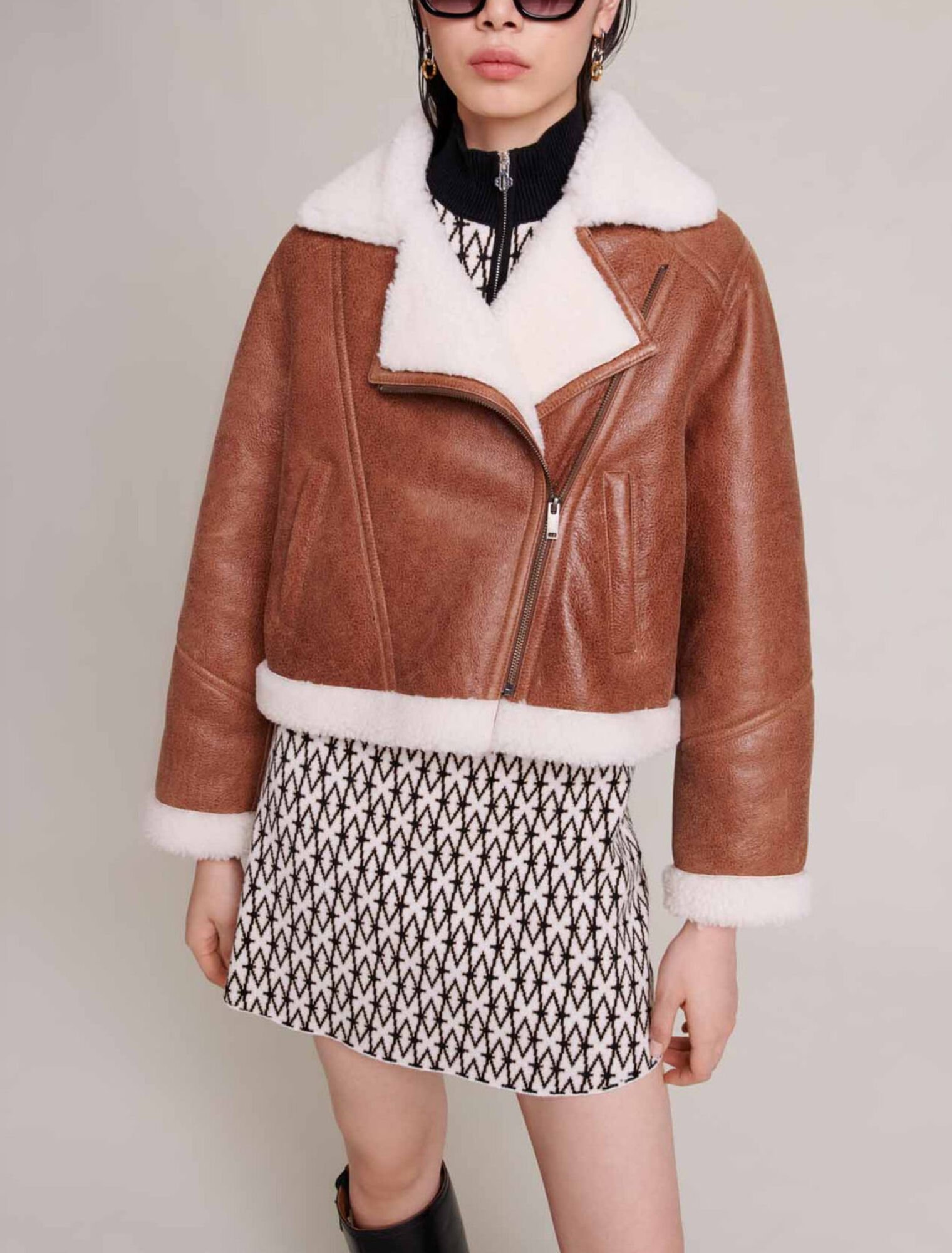 Blouson en cuir et fausse fourrure