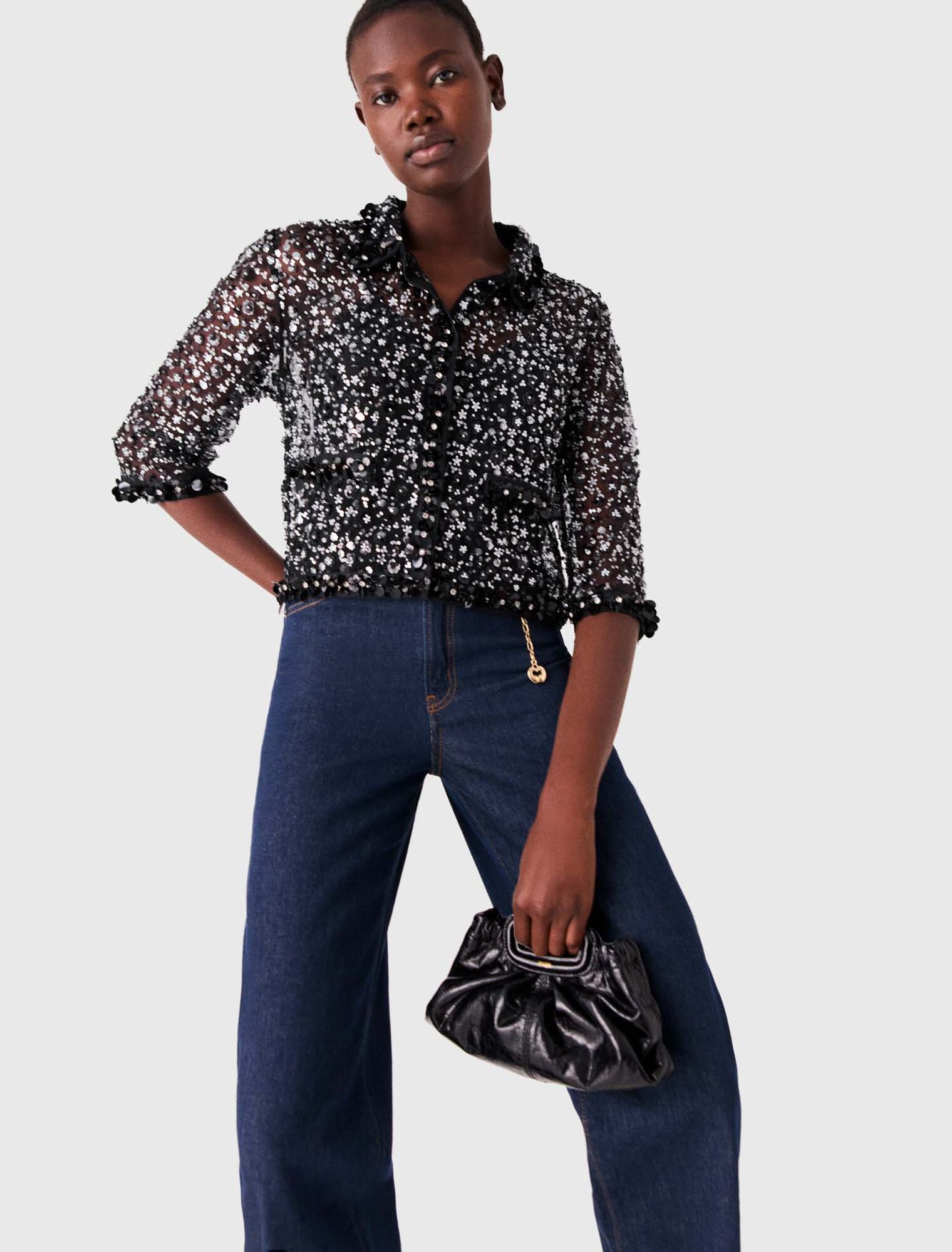 Polo strass&eacute; &agrave; motif floral