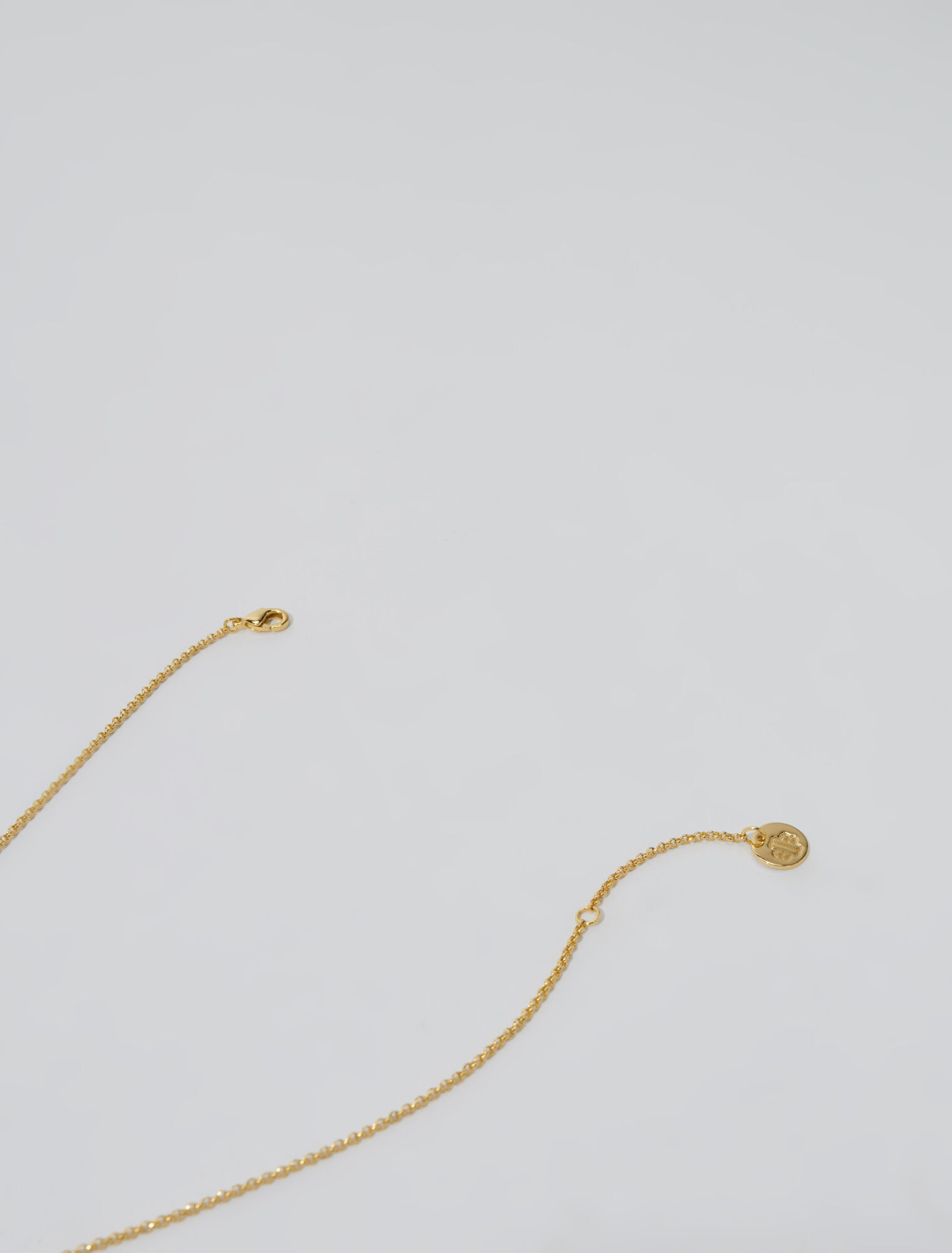 Collier doré orné de strass