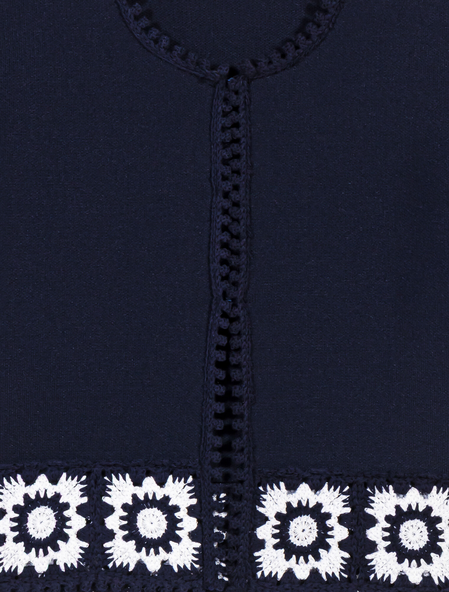 Cardigan with crochet panels