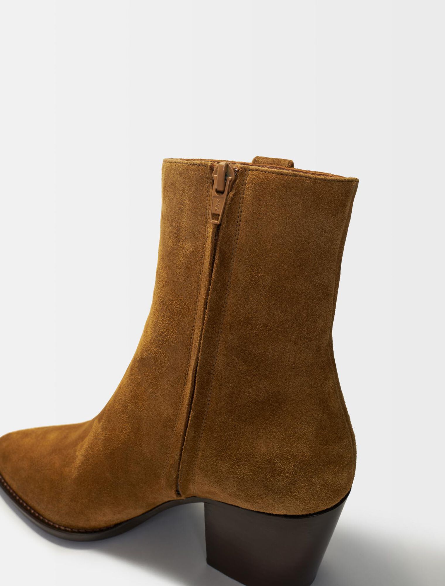 Cowboy boots in camel suede leather