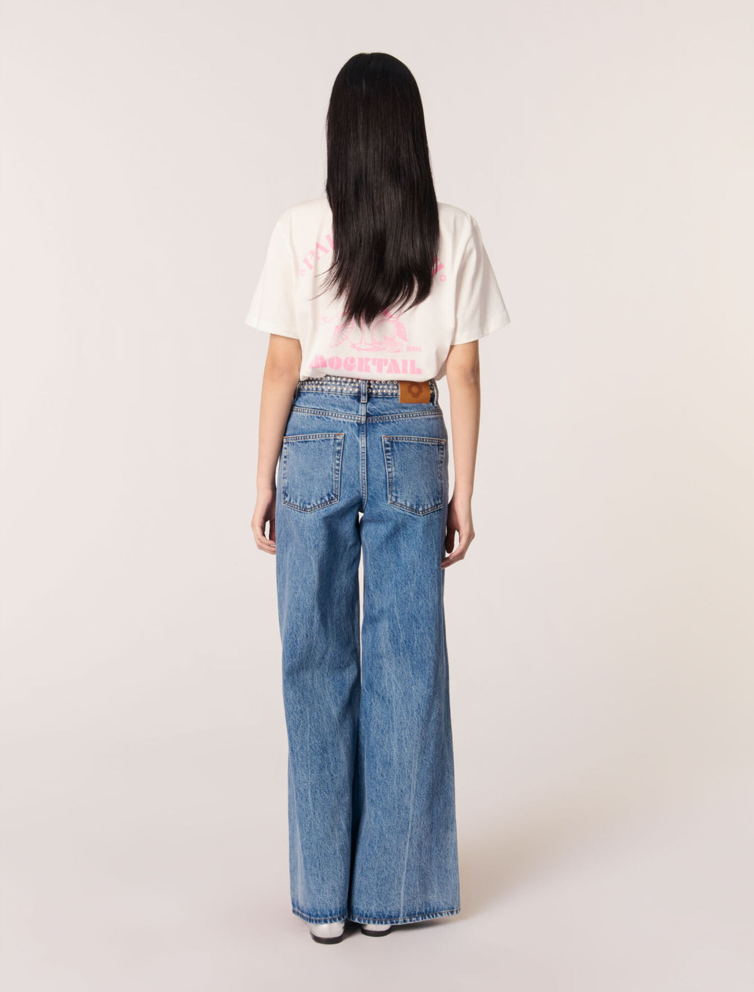 Jean flare &agrave; ceinture stud&eacute;e