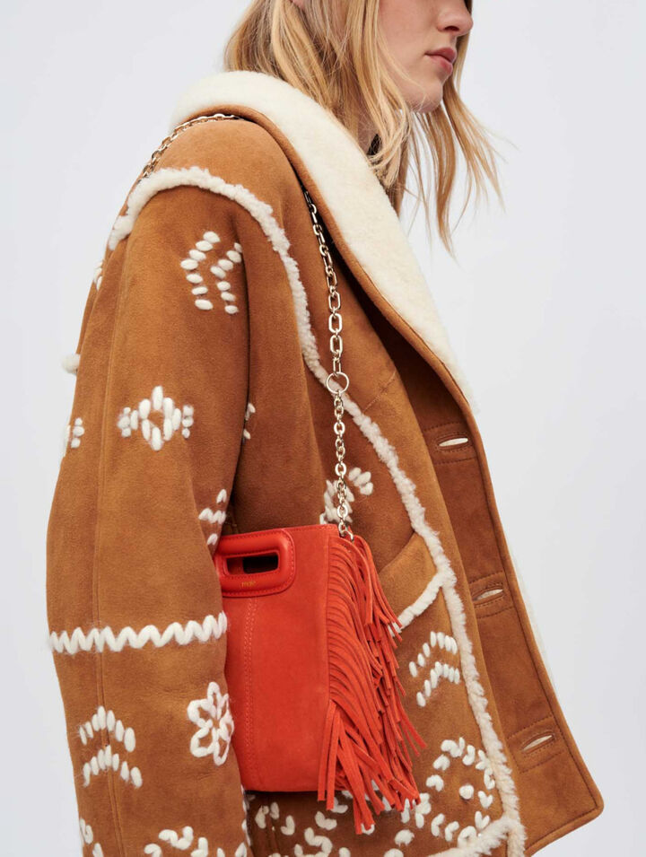 Manteau en peau de mouton lainée