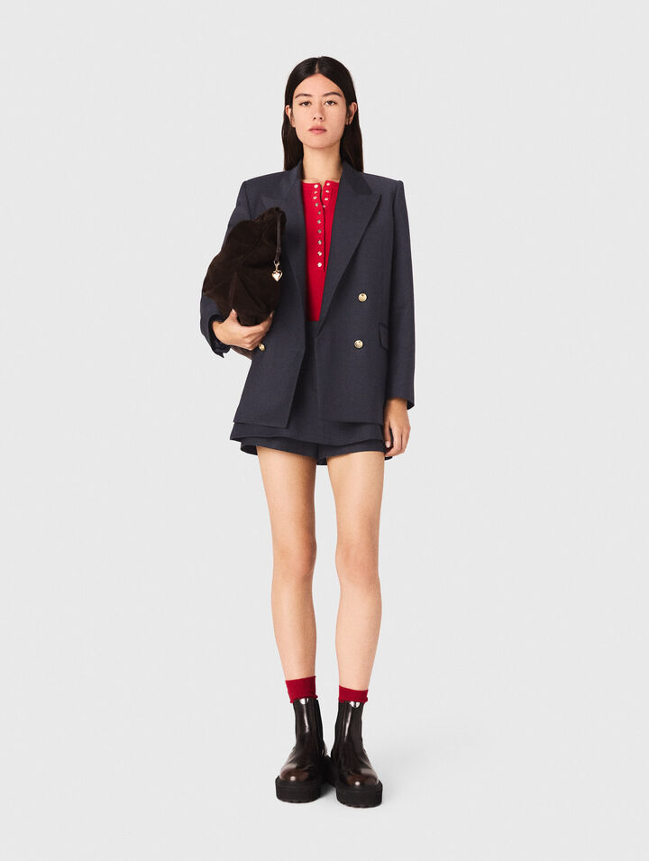 Veste tailleur à boutons dorés
