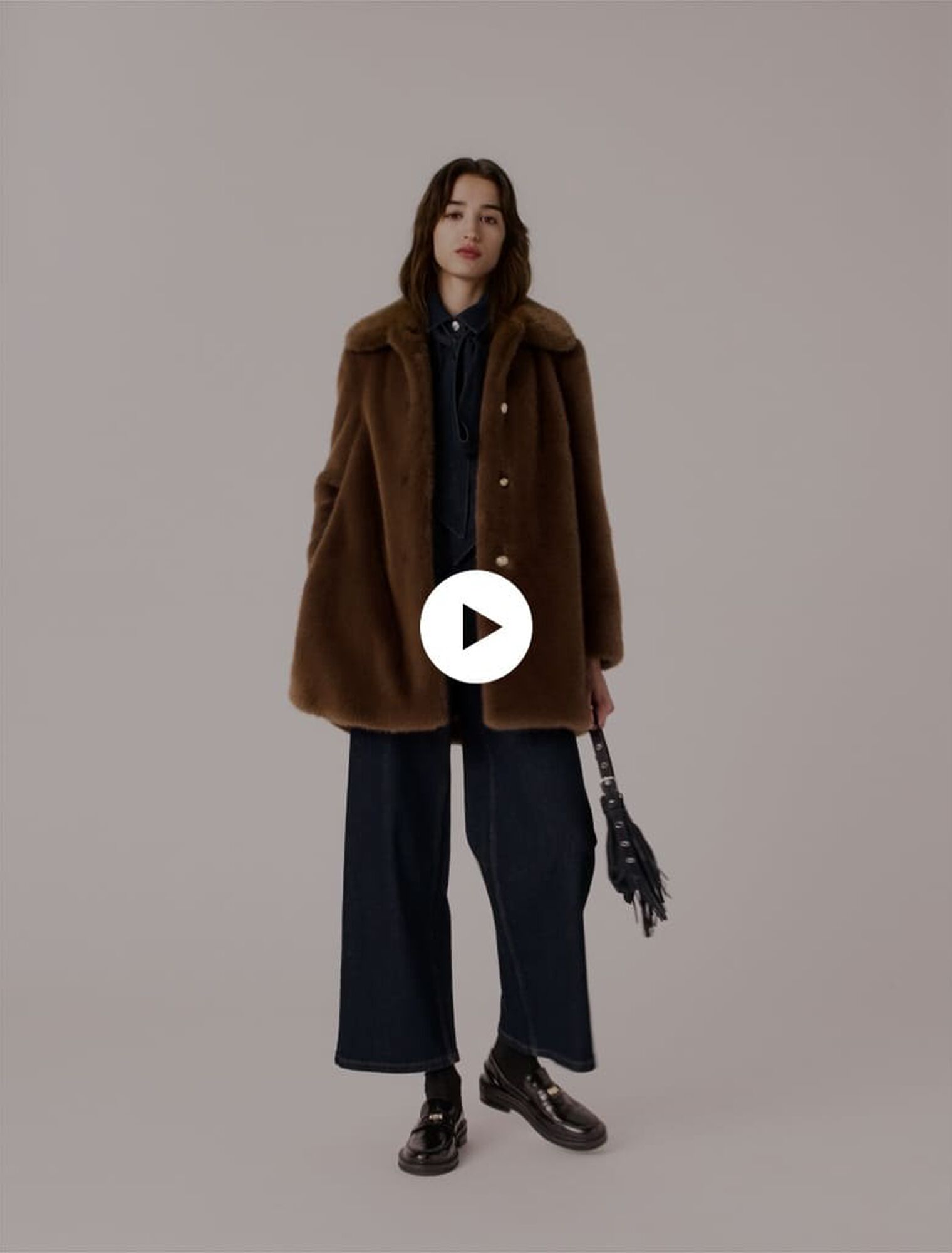 Manteau mi-long en fausse fourrure Manteau mi-long en fausse fourrure
