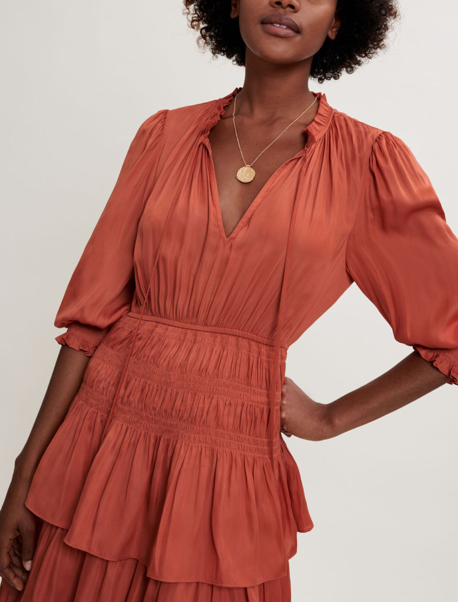 Satin dress with ruffles