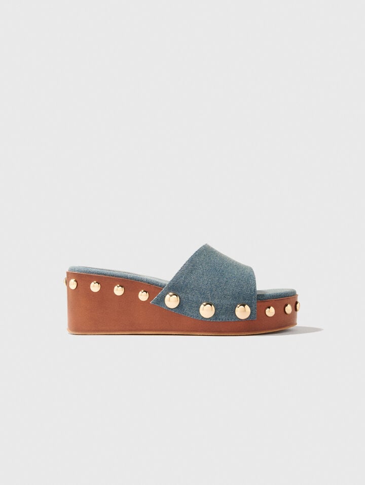 Mules compensées en denim à studs