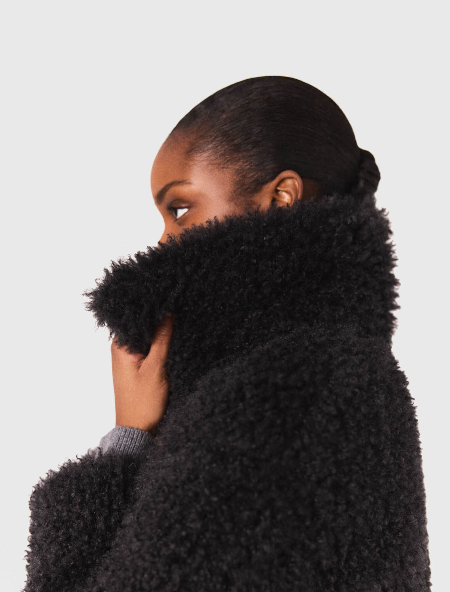 Manteau court en bouclette