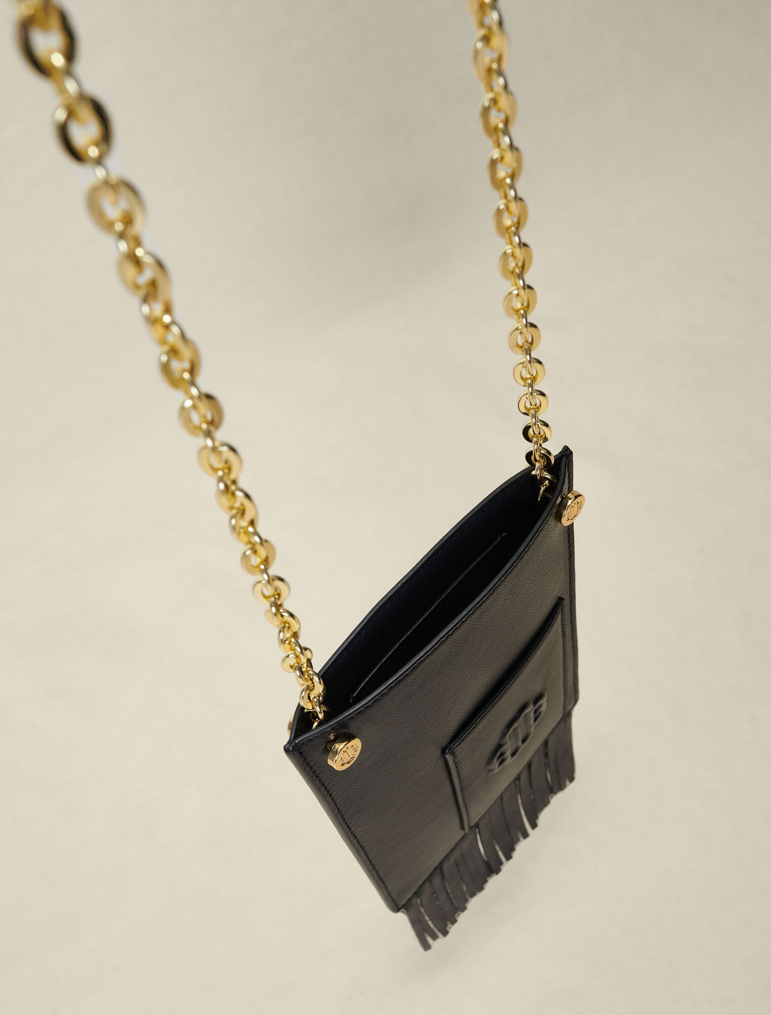 Leather fringe phone bag