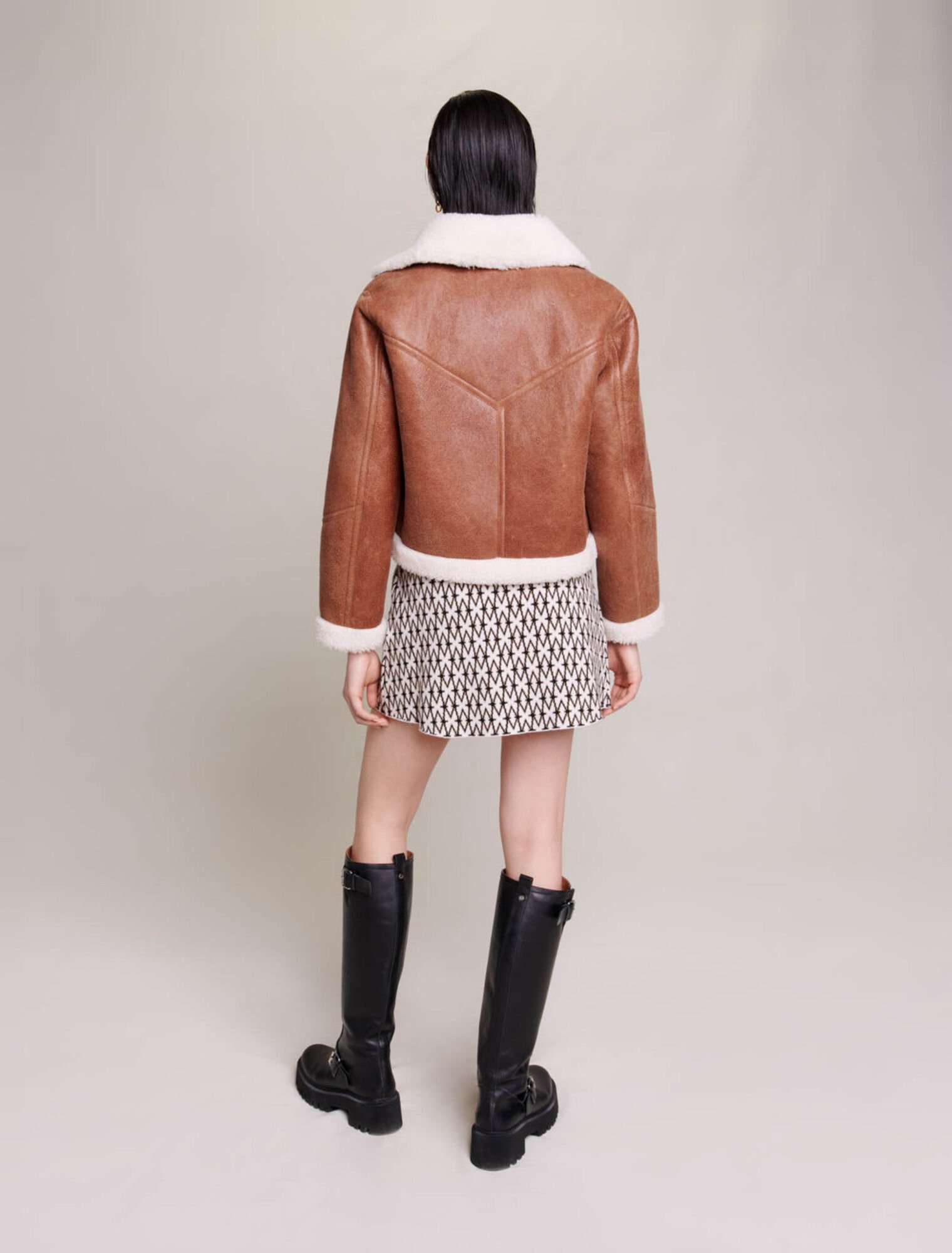 Blouson en cuir et fausse fourrure