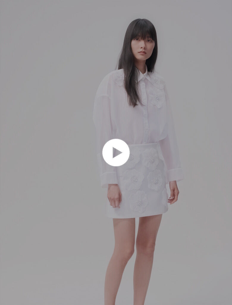 Jupe a fleurs perlees en satin blanc pour femme Maje