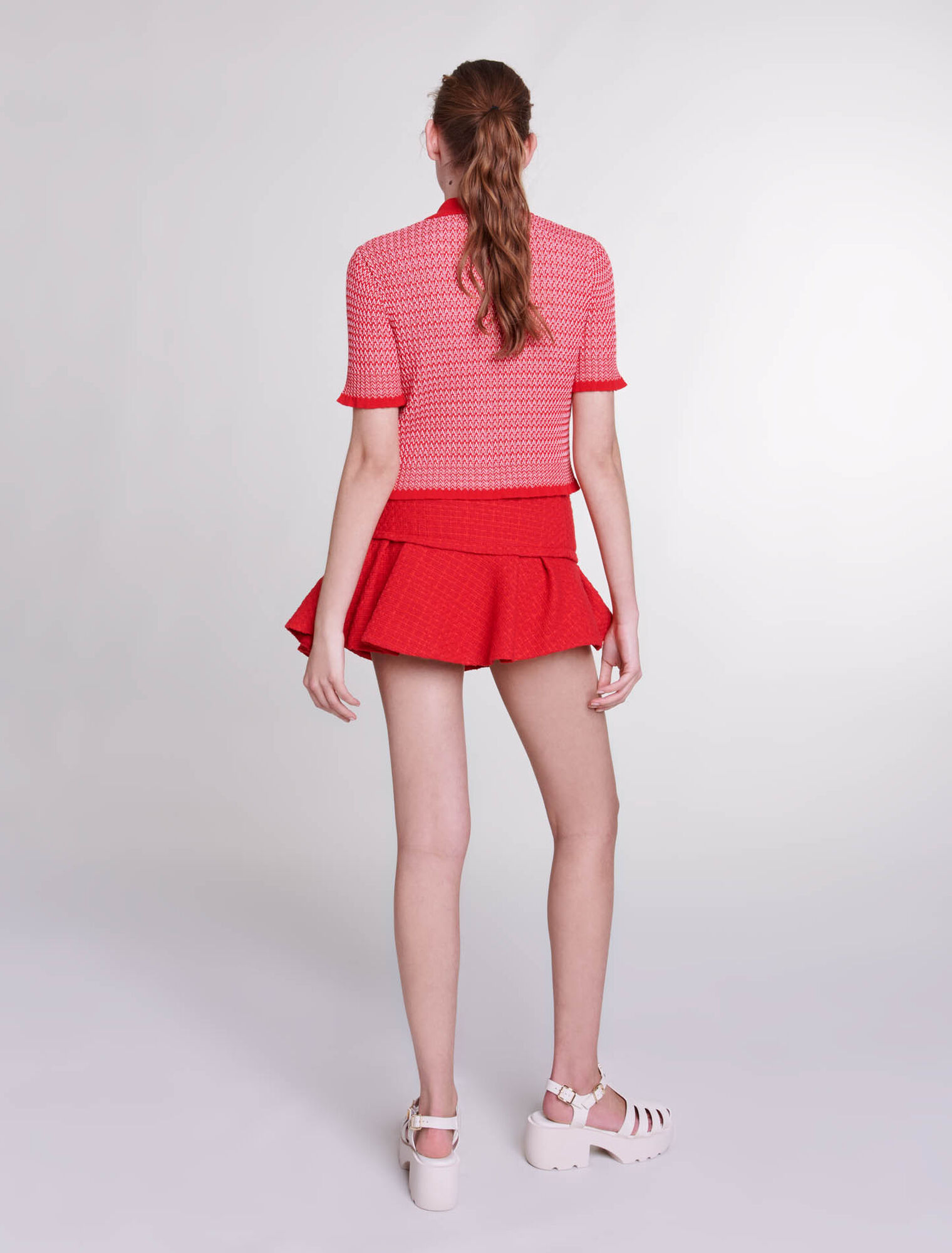 Mini-jupe en tweed asymétrique