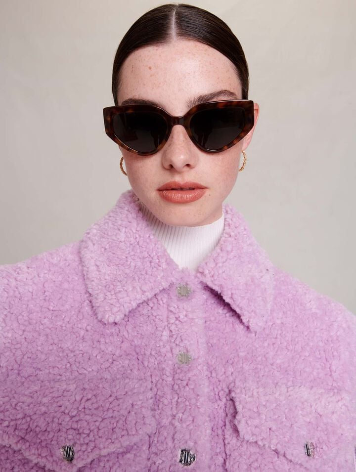 Blouson en fausse fourrure et maille