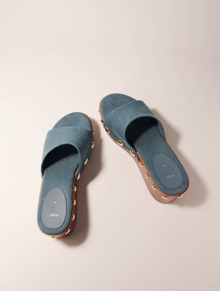 Mules compensées en denim à studs
