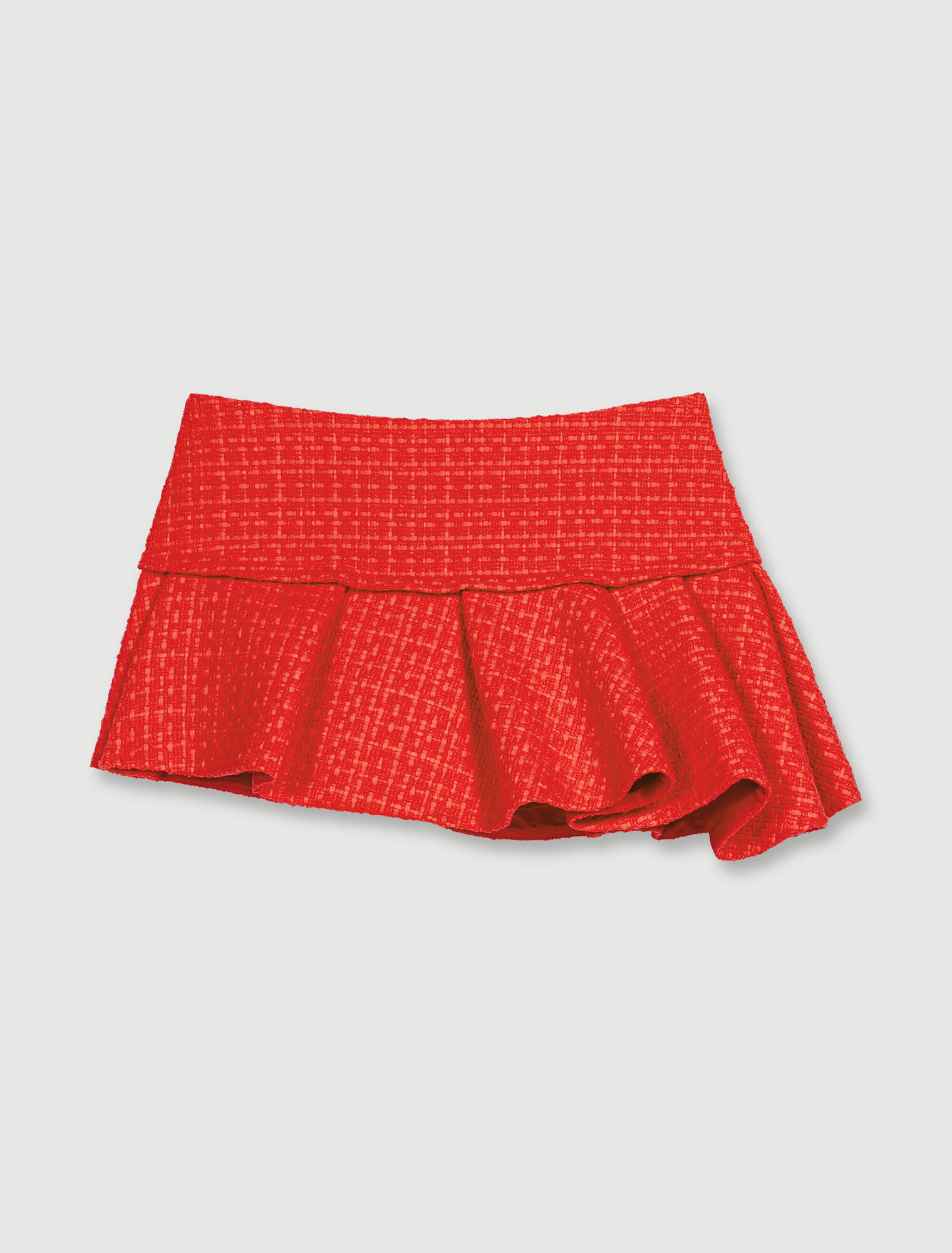Mini-jupe en tweed asymétrique