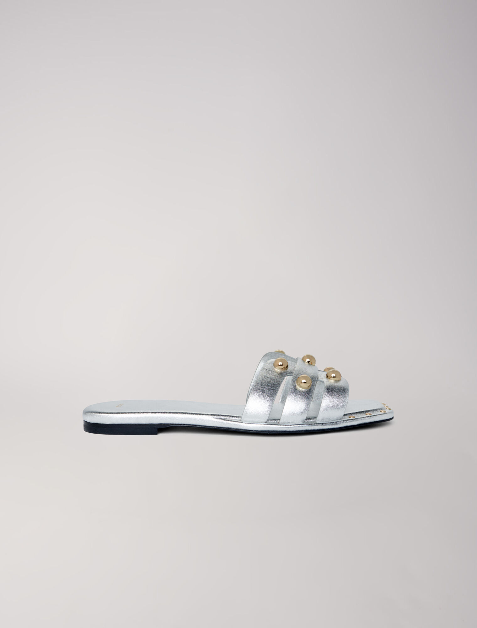 Mules en cuir ornées de studs