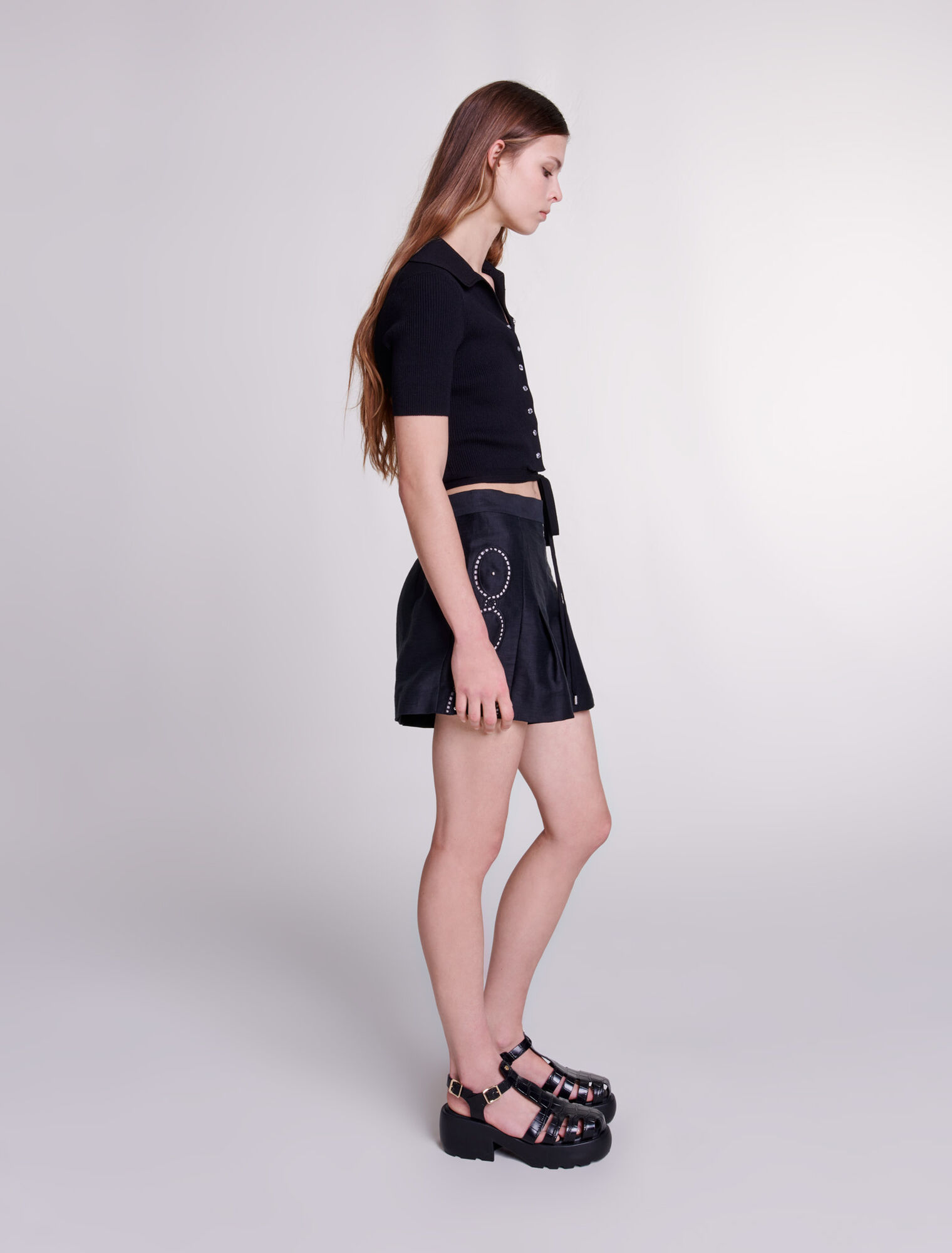 Openwork linen shorts with rivets