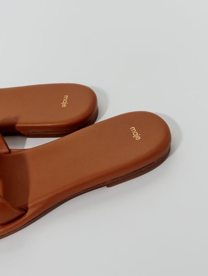 Mules en cuir ornées de studs