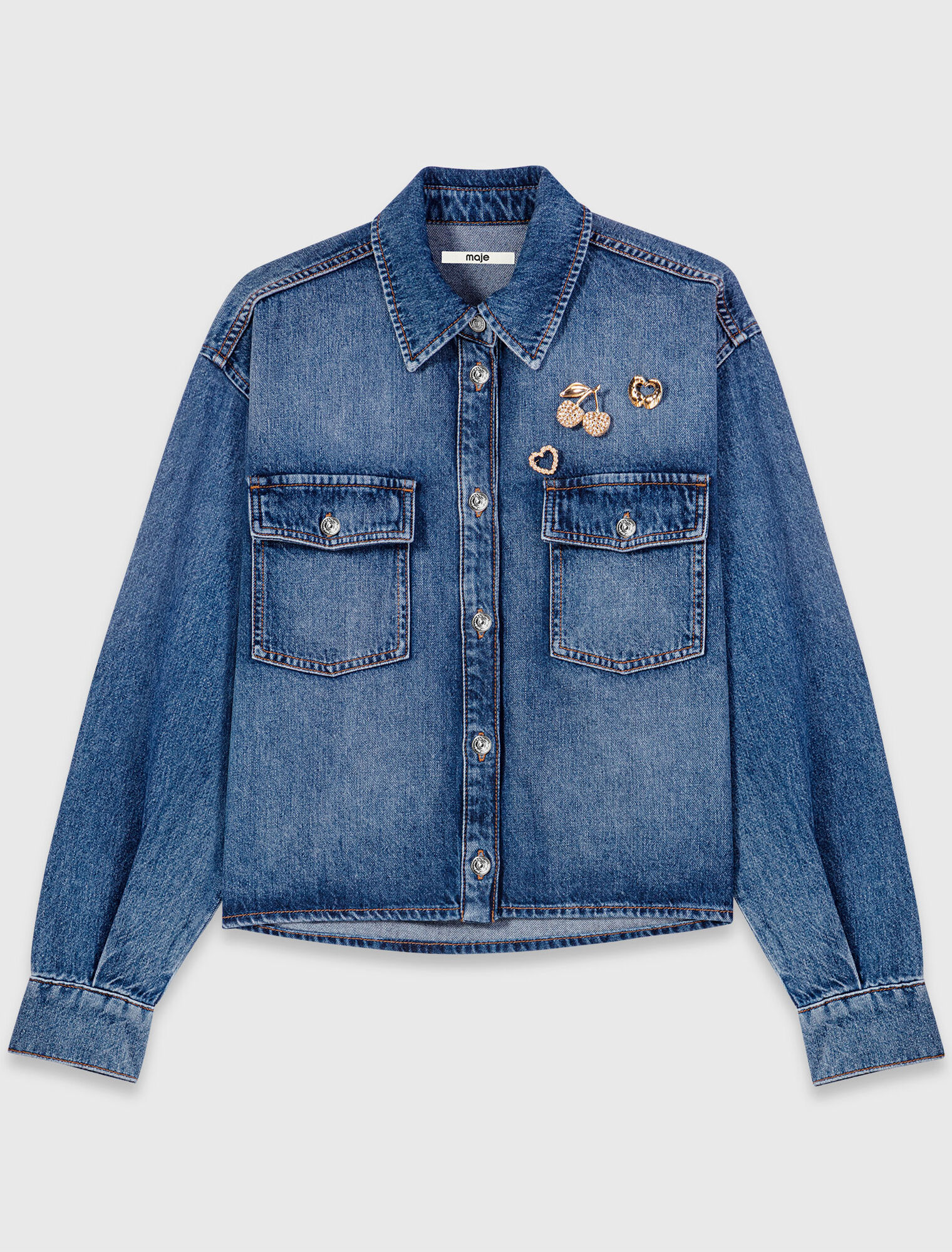 Denim shirt with brooches