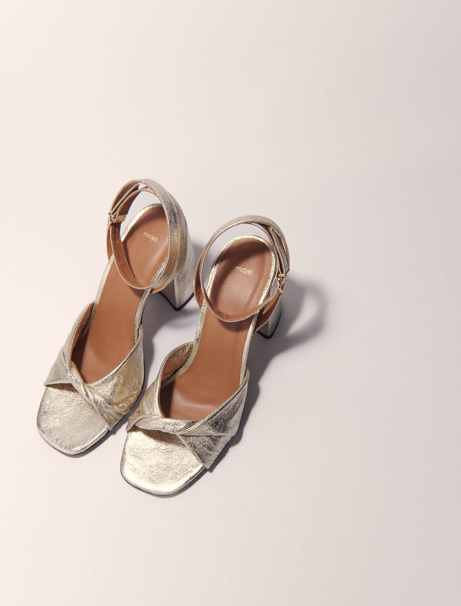 Metallic leather sandals with heels