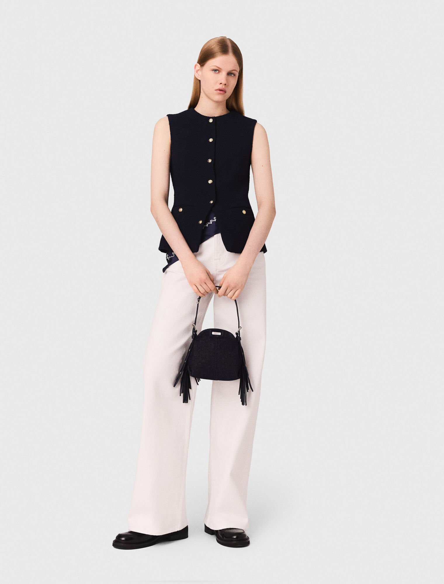 Sleeveless tweed jacket