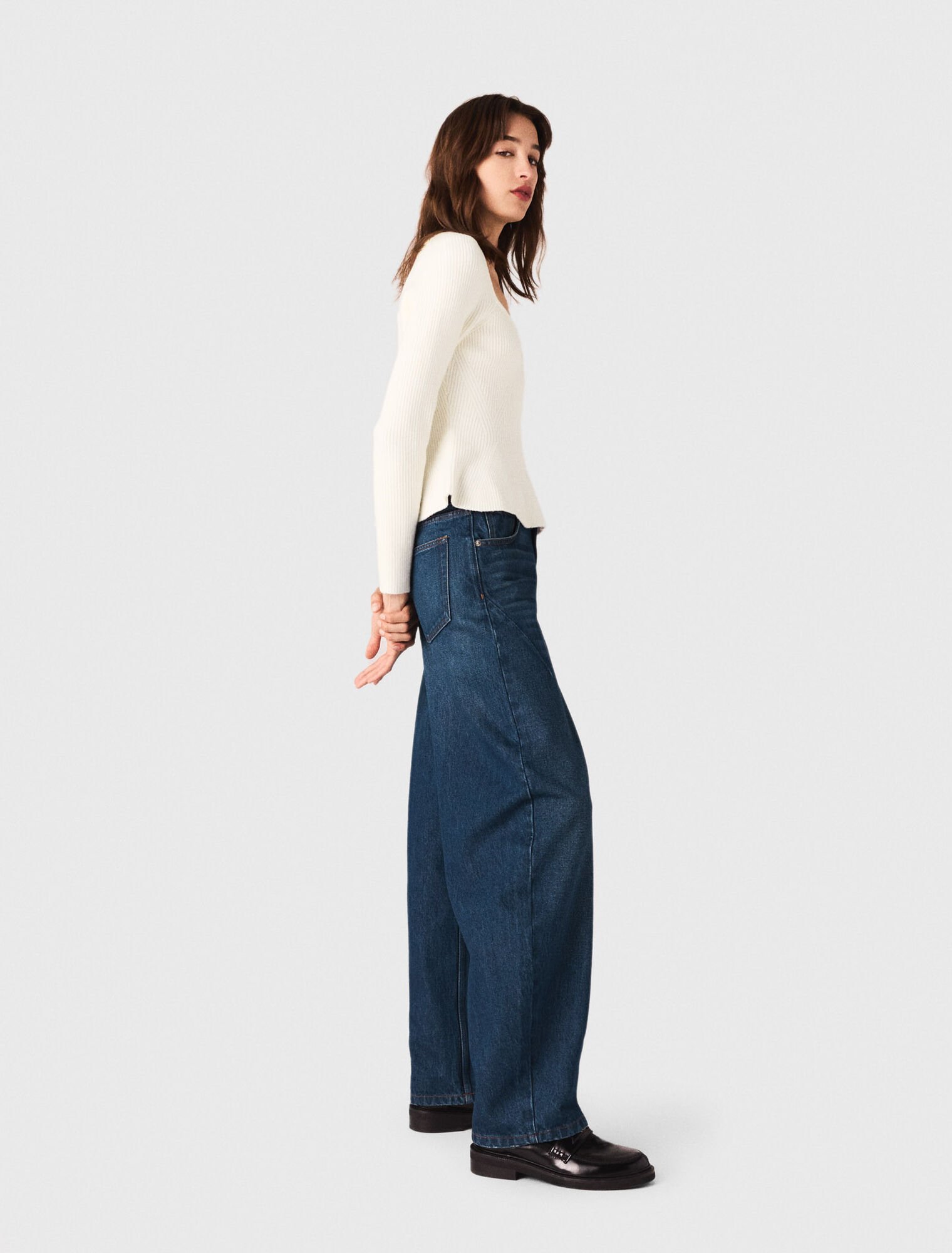 Pull en maille à taille péplum