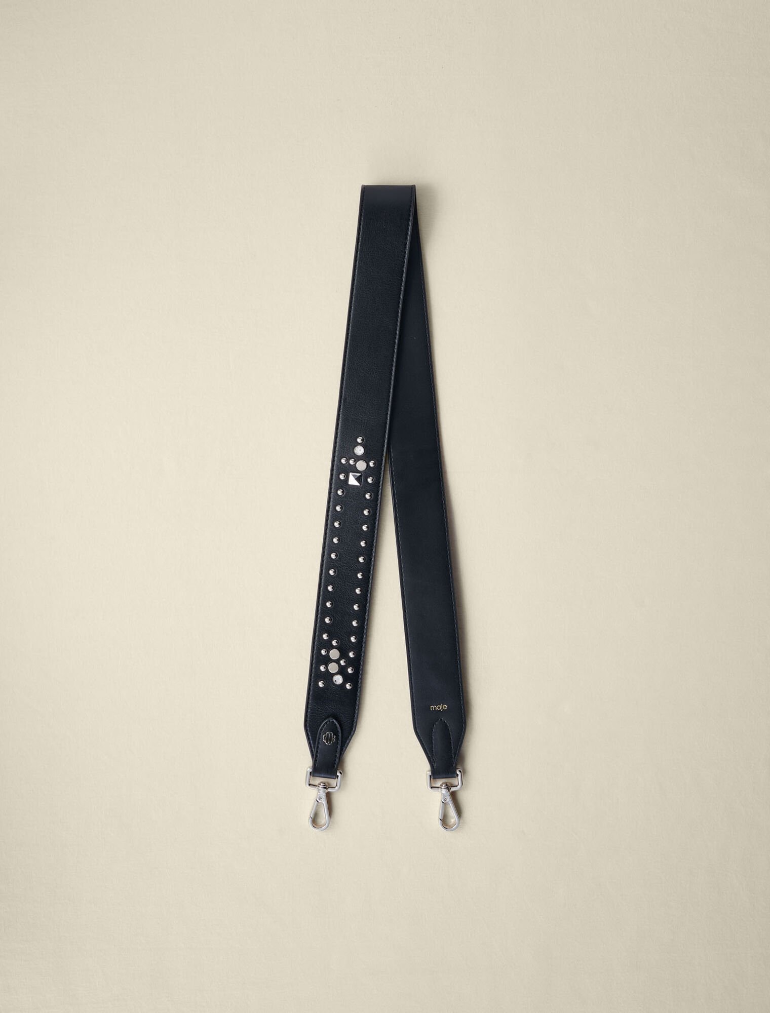 Studded leather shoulder strap