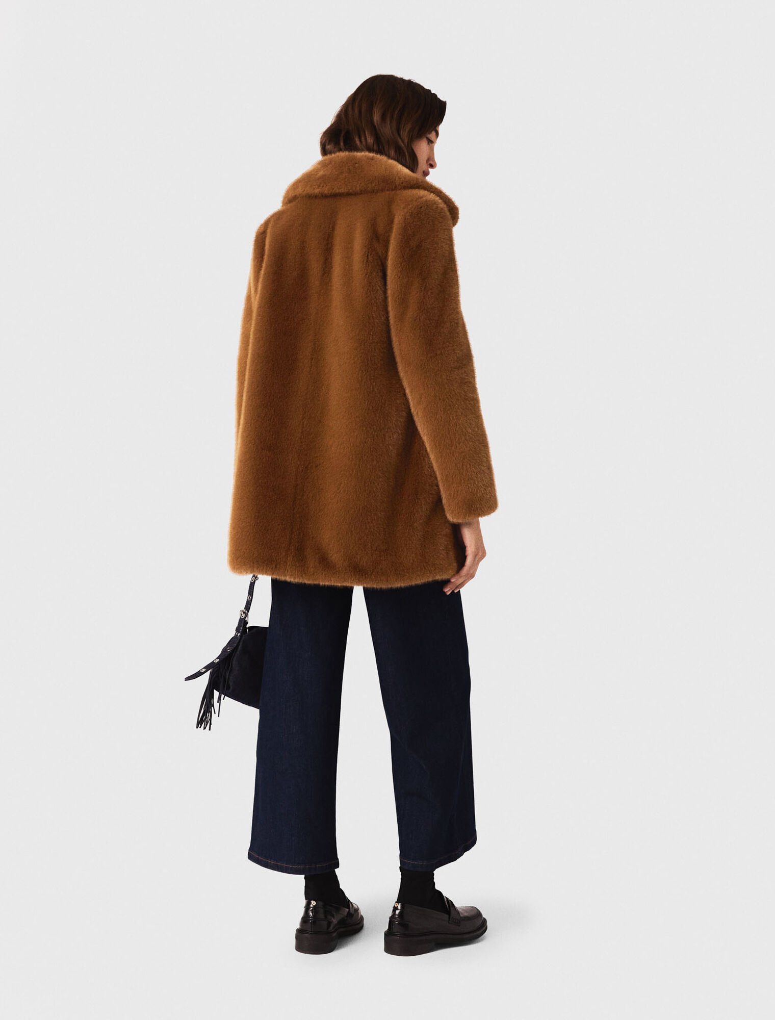 Manteau mi-long en fausse fourrure Manteau mi-long en fausse fourrure