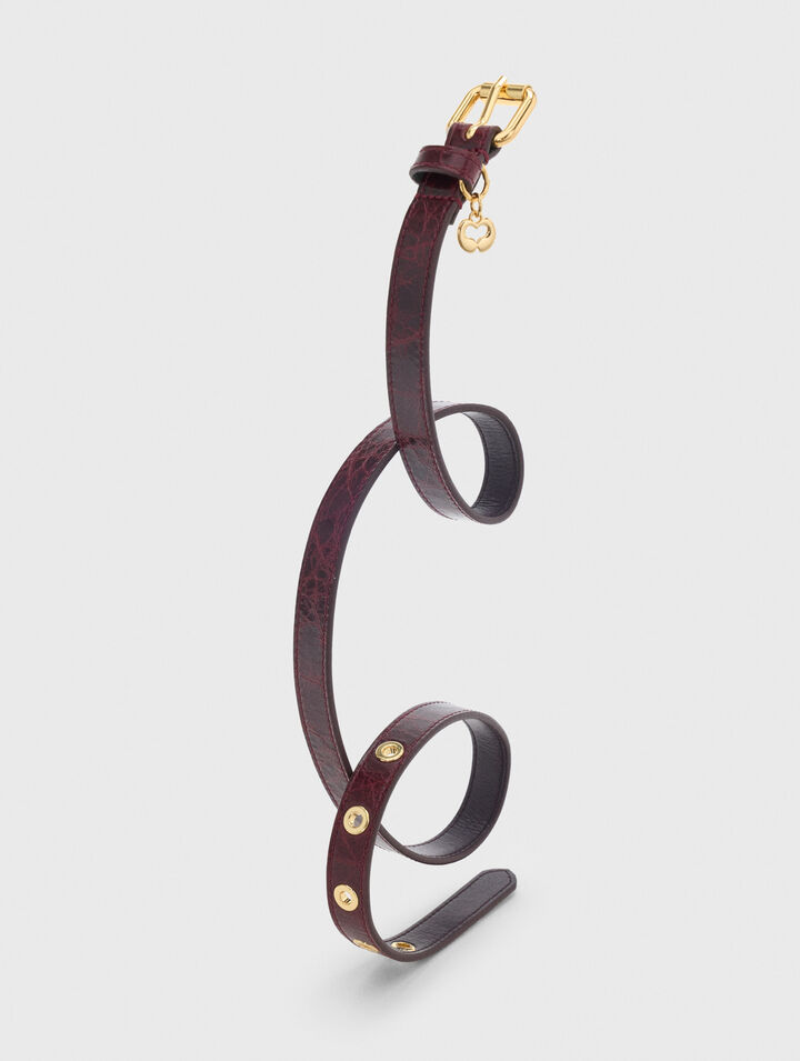 Slim leather belt with eyelets