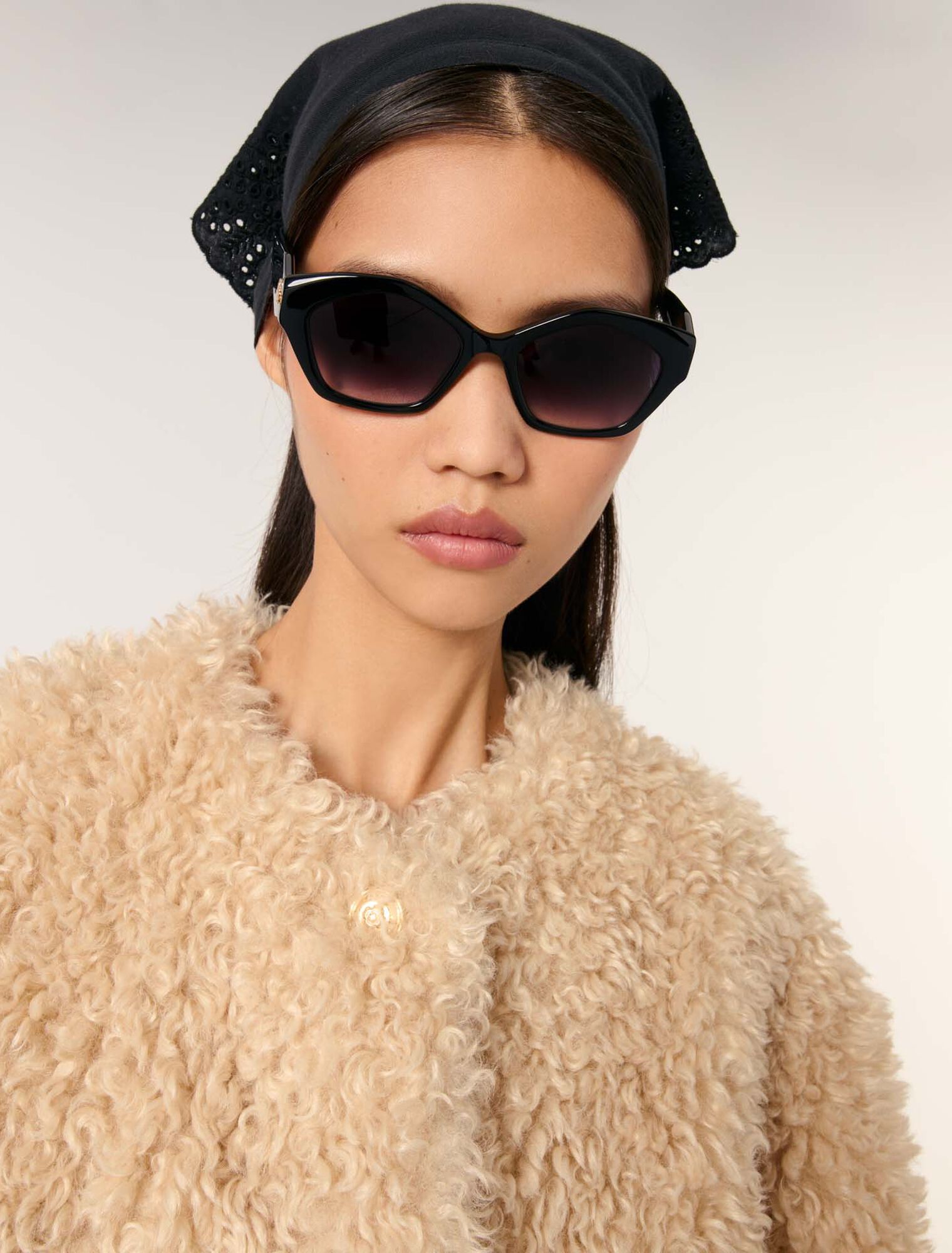 Manteau court en fausse fourrure