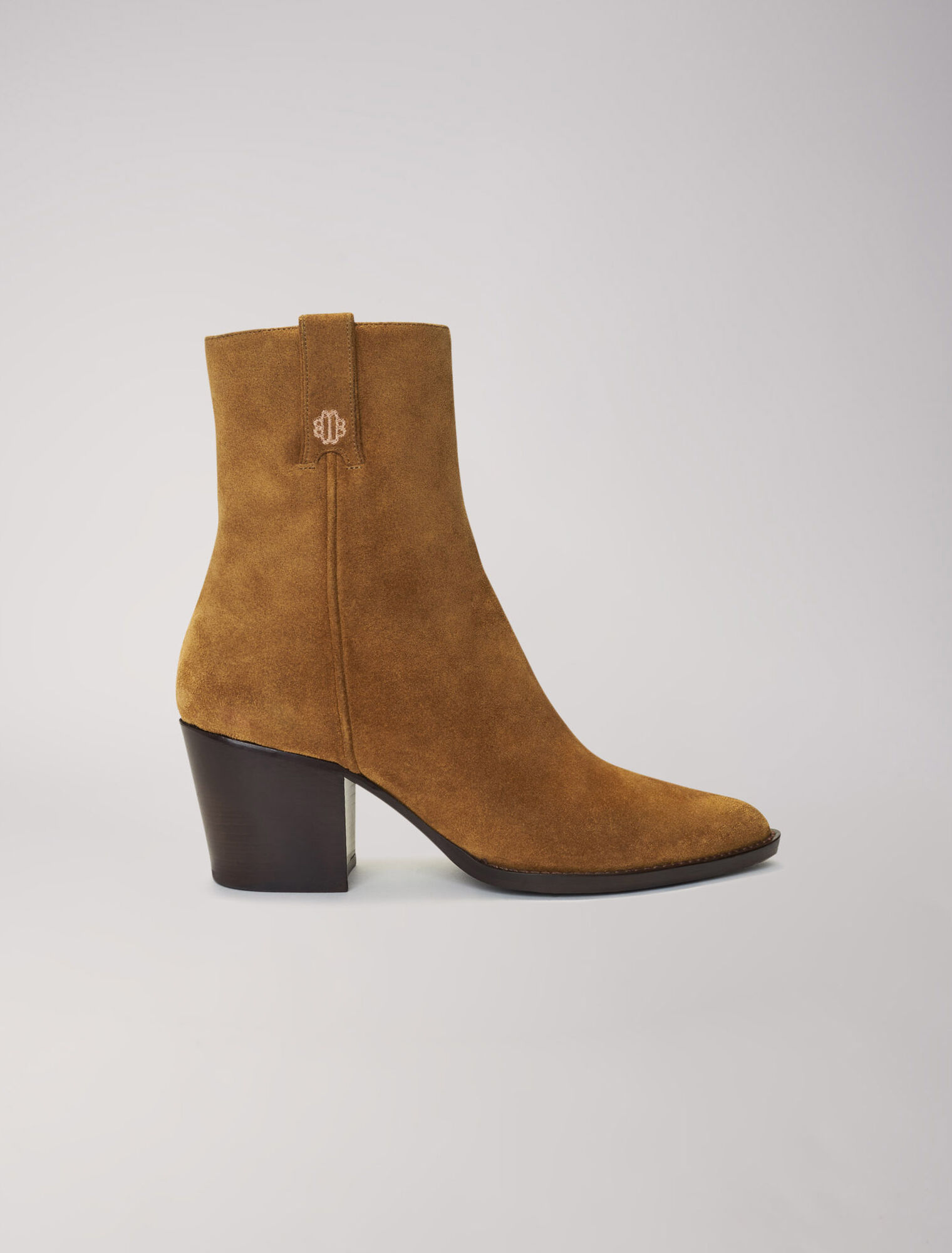 Cowboy boots in camel suede leather