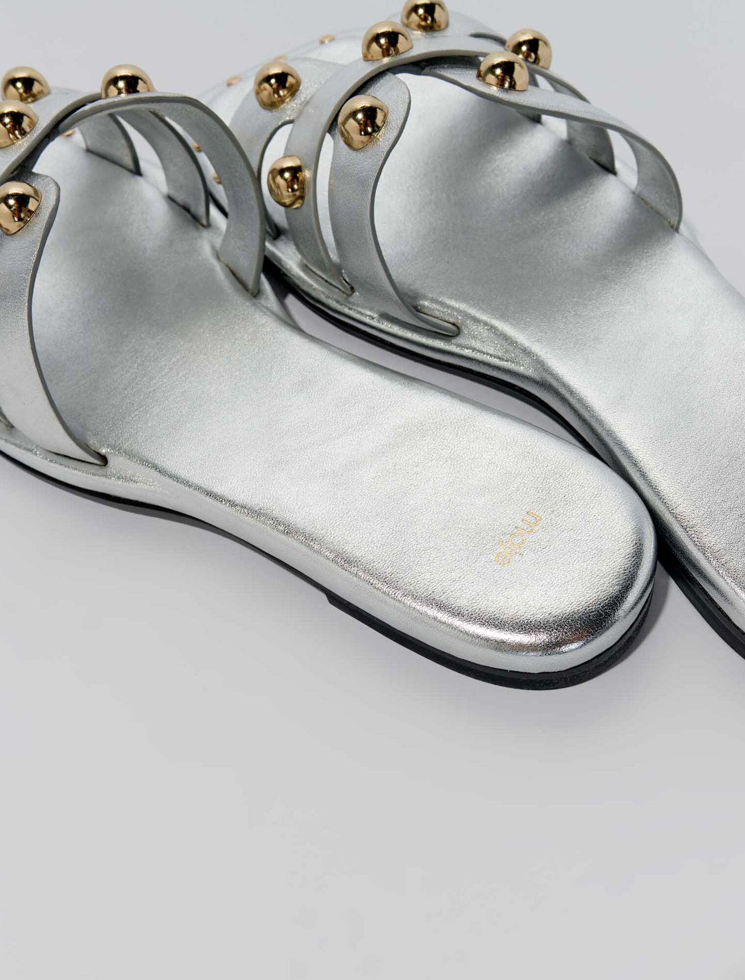Mules en cuir ornées de studs