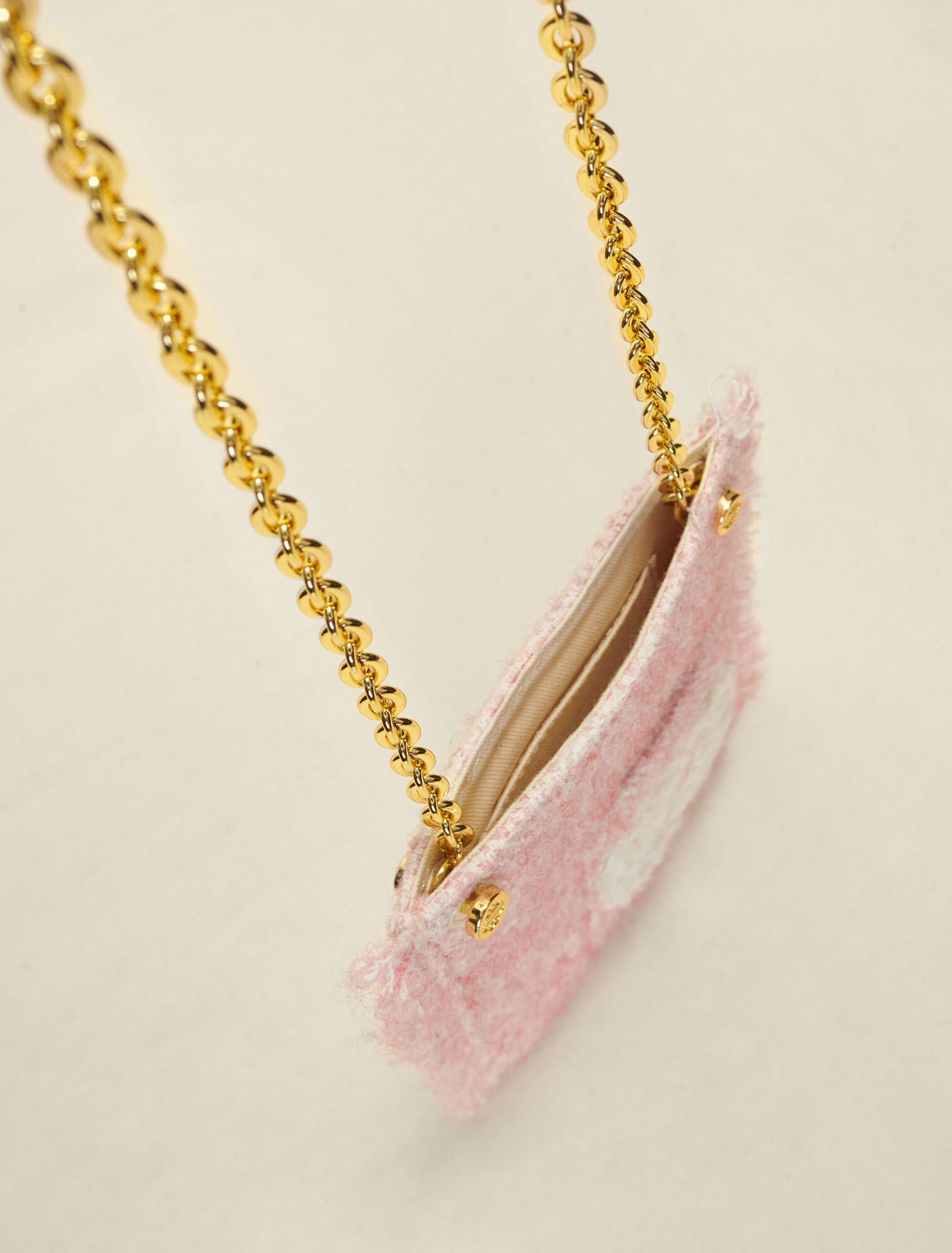 Pink tweed-effect phone bag