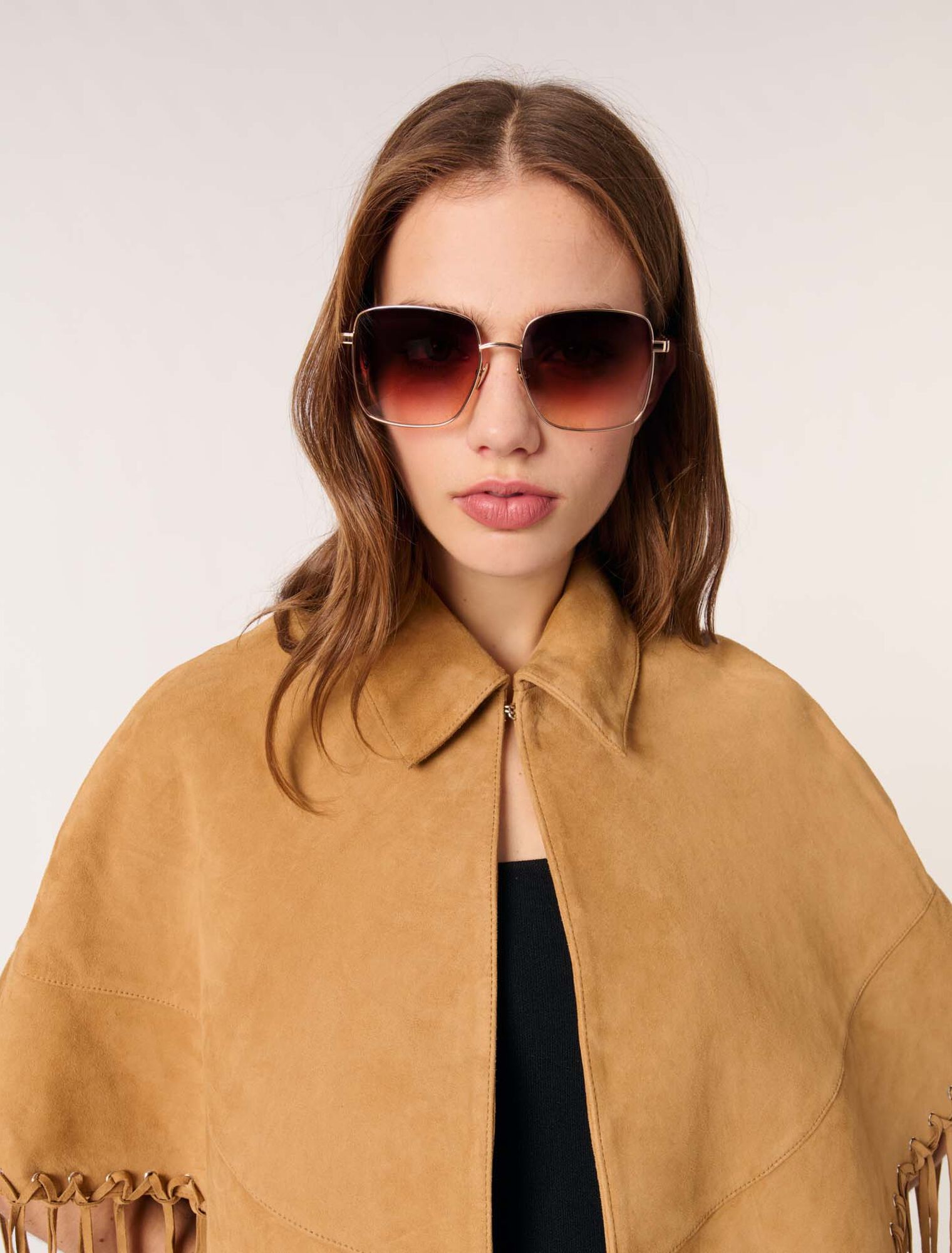 Short leather fringed coat
