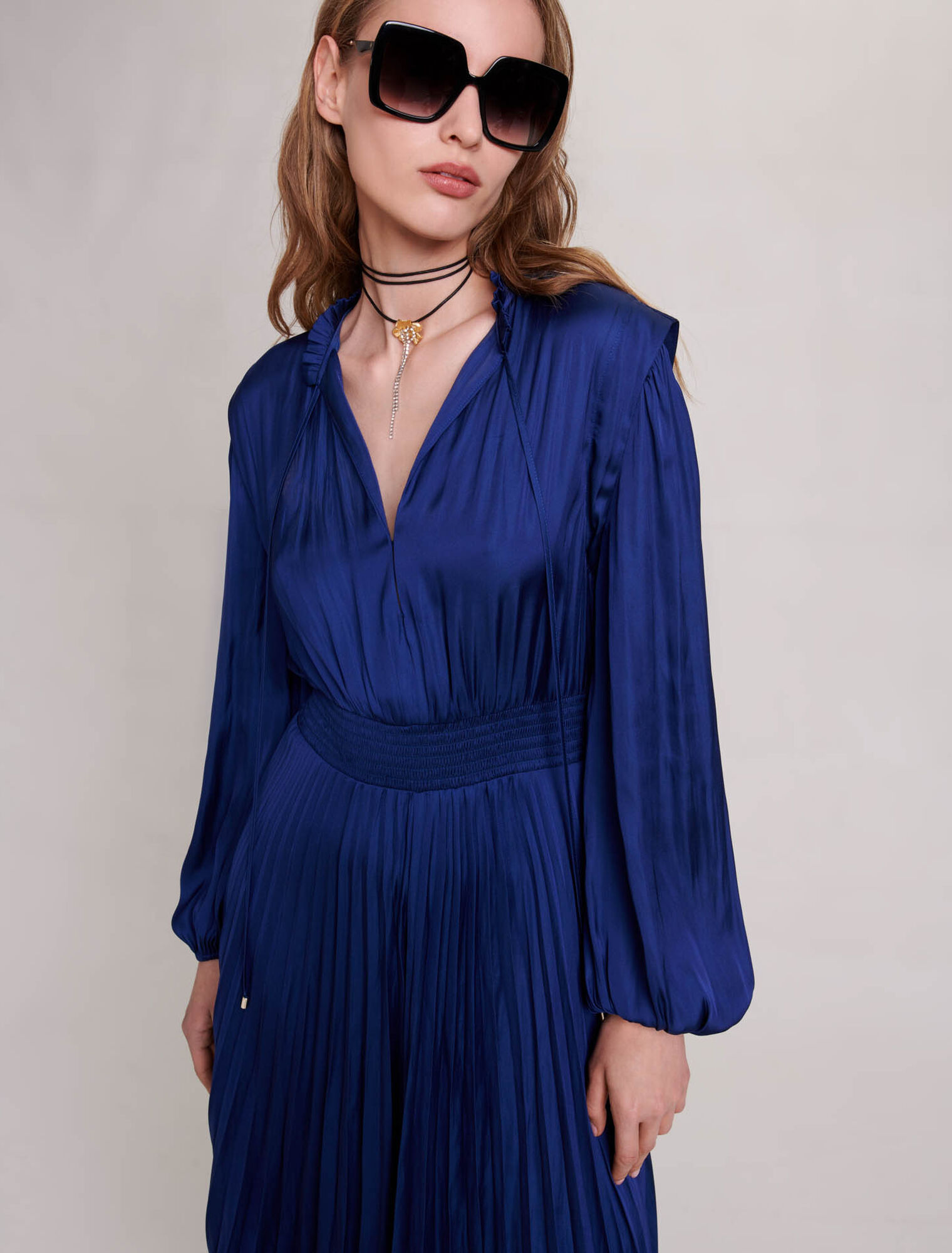 Pleated and satiny midi dress