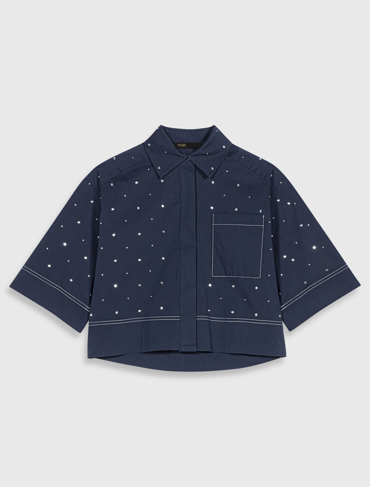 Chemise cropped ornée de clous